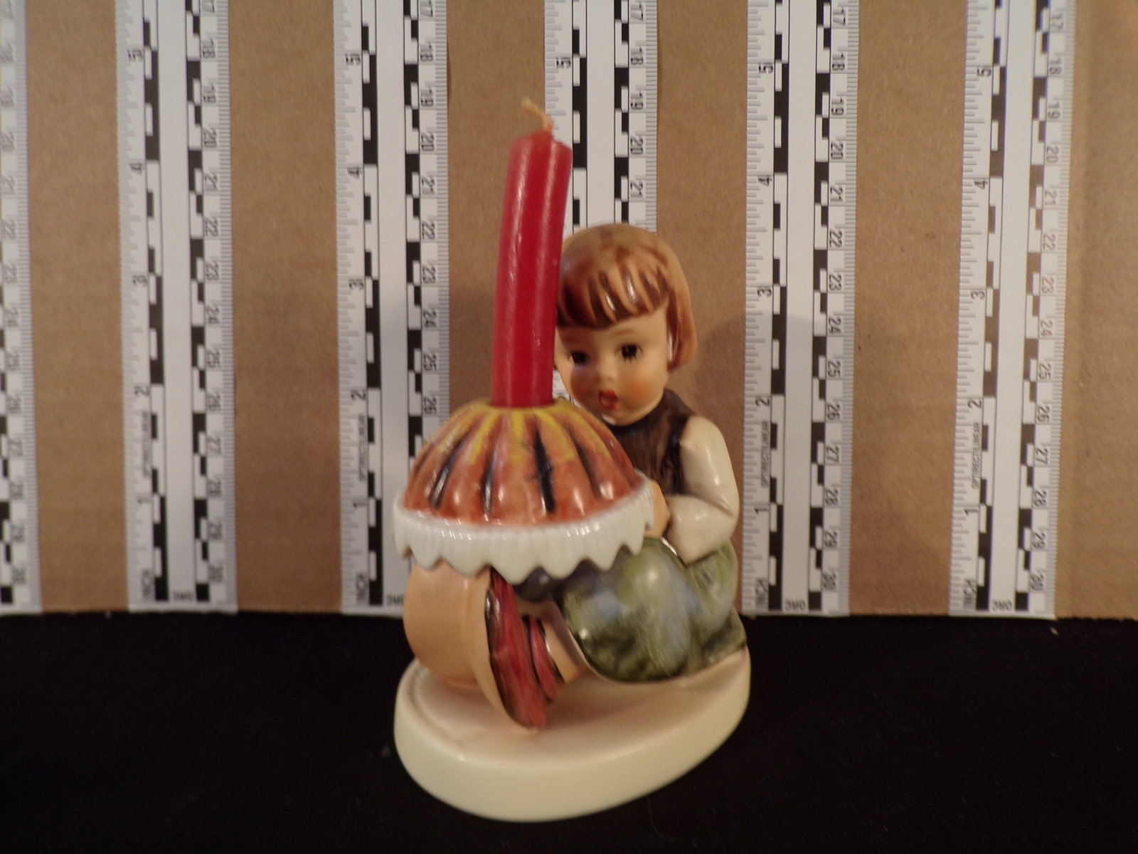 Hummel #338, Trademark # - 6, Figurine Name - Birthday Cake: Up for auction is Hummel #338, Trademark # - 6, Figurine Name - Birthday Cake, This hummel does not have a box and displays these special attributes: None. This Hummel is in excellent condition with n