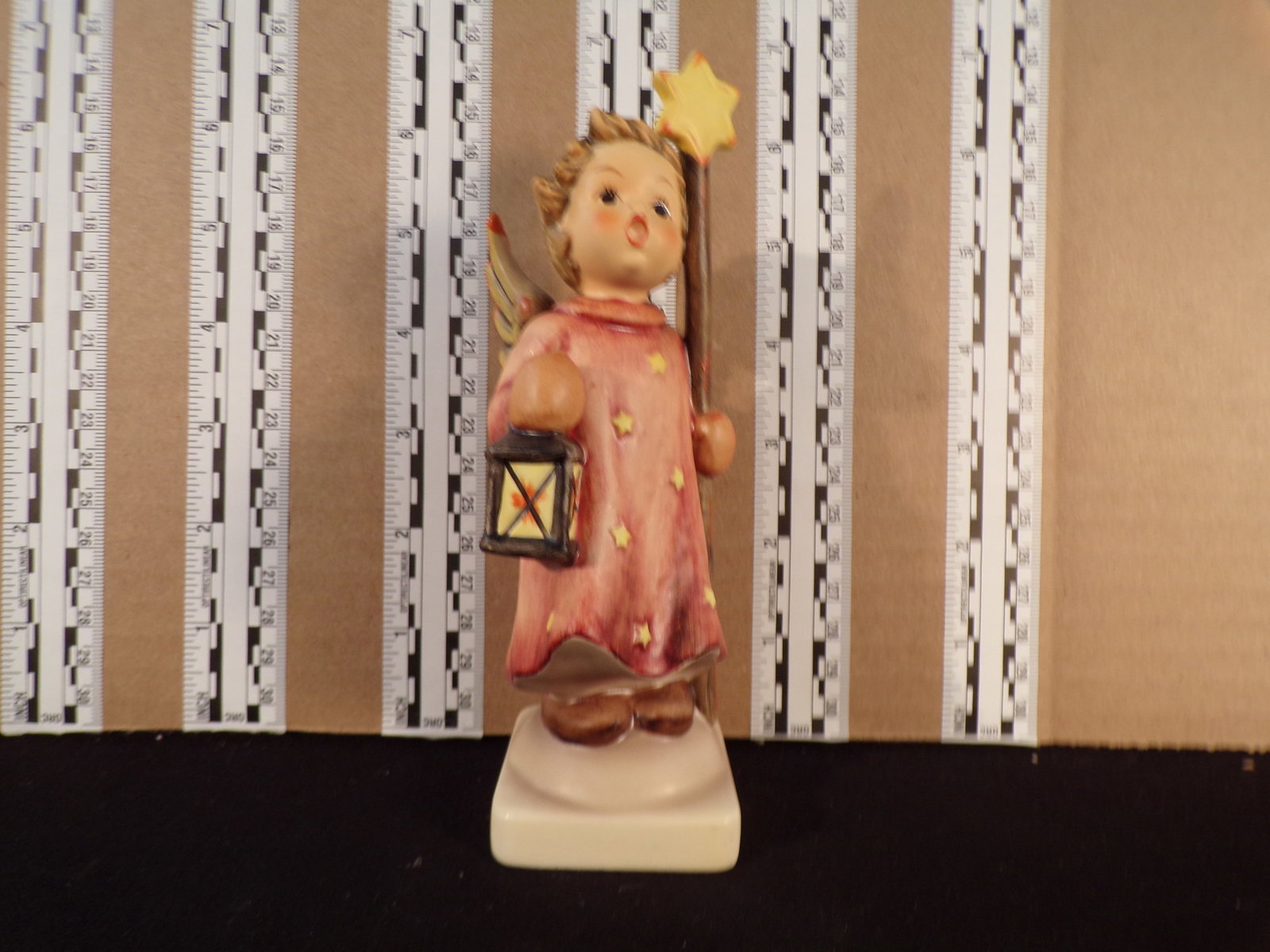 Hummel #343, Trademark # - 6, Figurine Name - Christmas Song: Up for auction is Hummel #343, Trademark # - 6, Figurine Name - Christmas Song, This hummel does not have a box and displays these special attributes: None. This Hummel is in excellent condition with 
