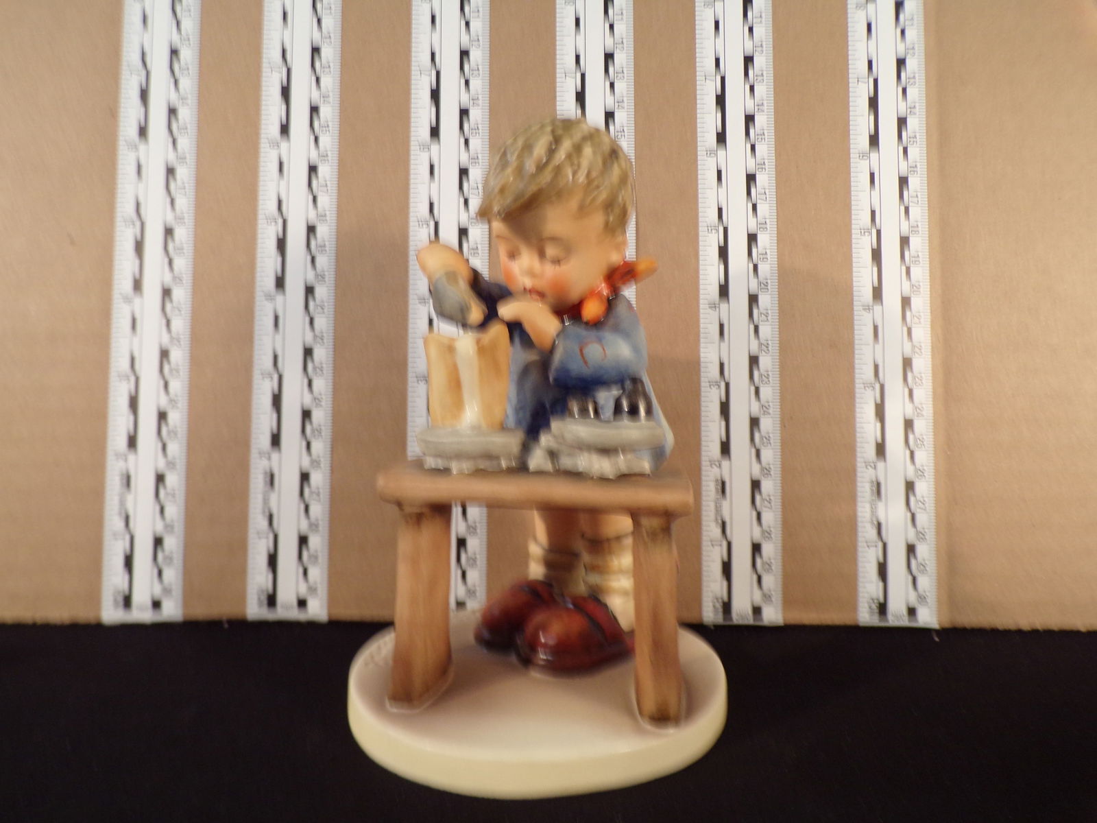 Hummel #345, Trademark # - 5, Figurine Name - A Fair Measure: Up for auction is Hummel #345, Trademark # - 5, Figurine Name - A Fair Measure, This hummel does not have a box and displays these special attributes: None. This Hummel is in excellent condition with