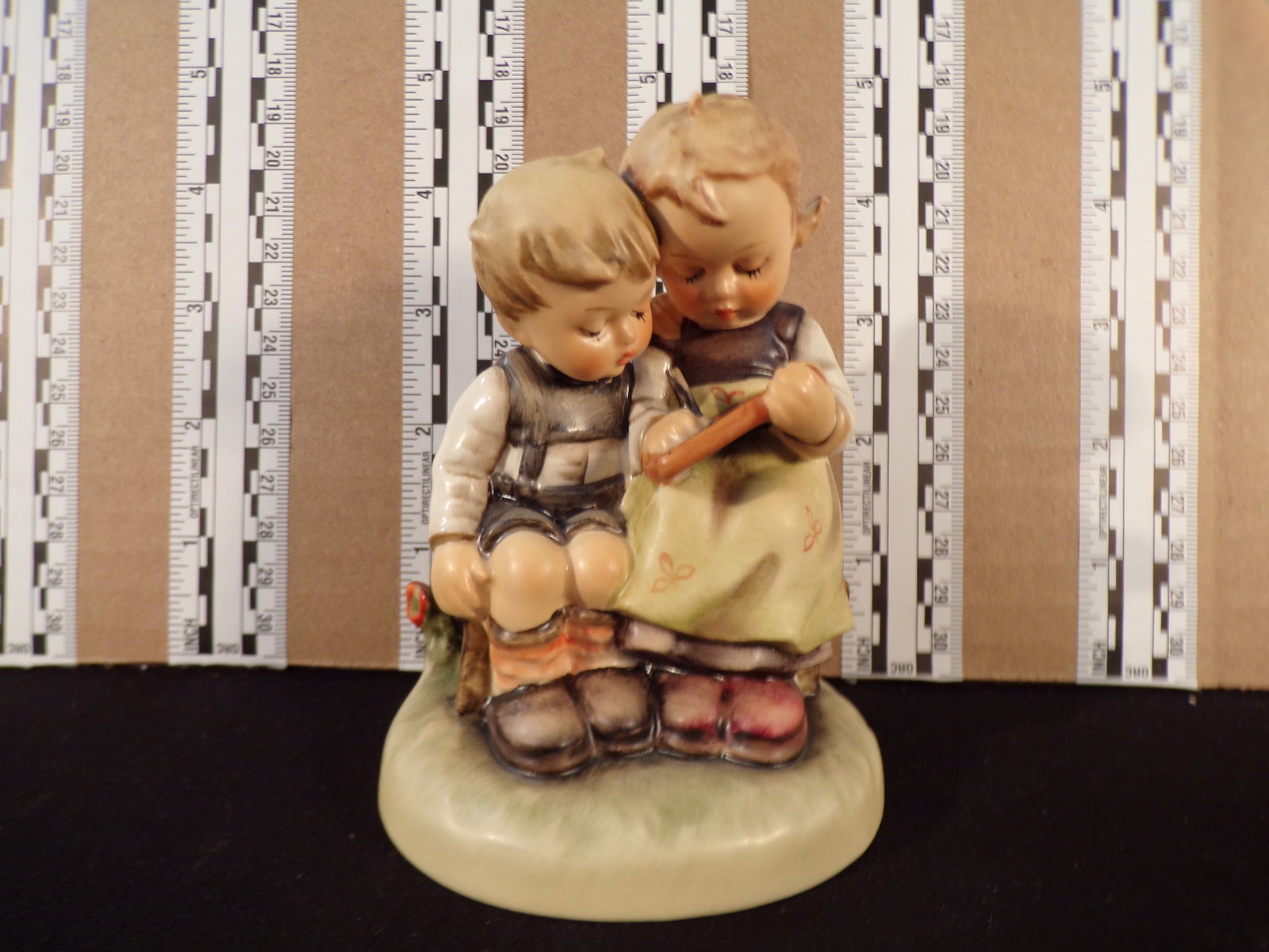 Hummel #346, Trademark # - 4, Figurine Name - Smart Little Sister: Up for auction is Hummel #346, Trademark # - 4, Figurine Name - Smart Little Sister, This hummel does not have a box and displays these special attributes: None. This Hummel is in excellent condition 