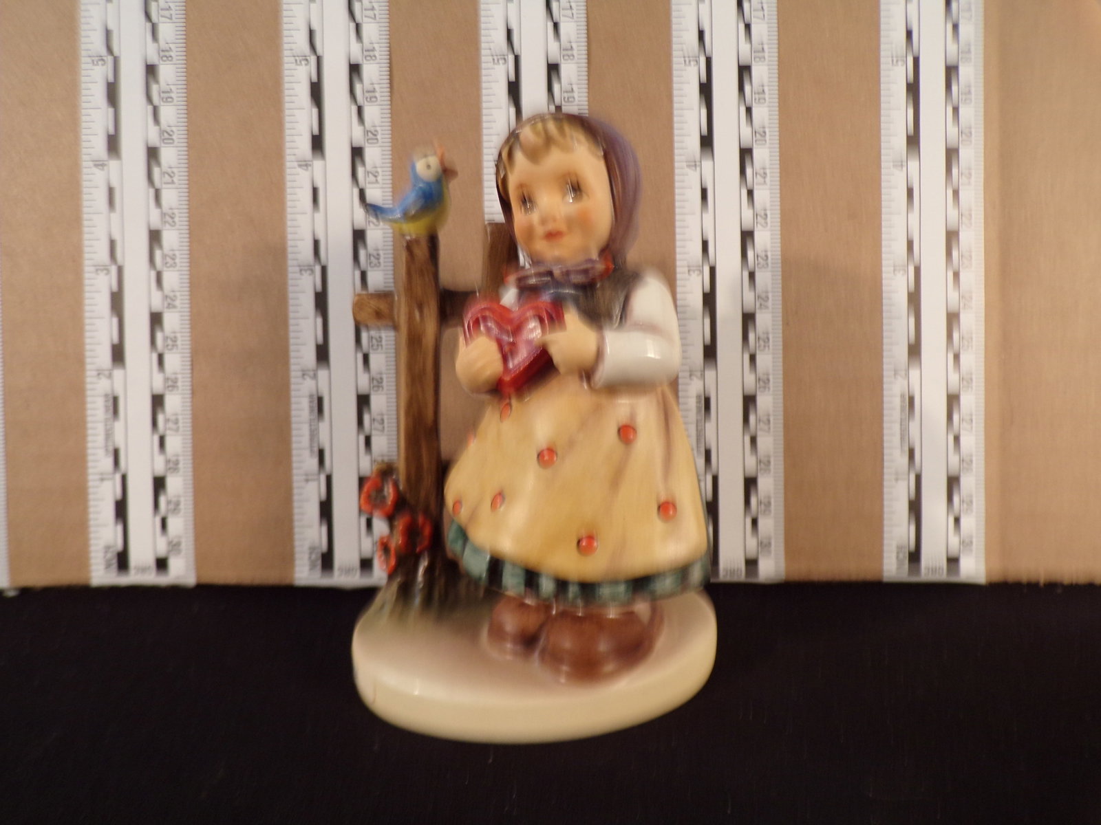 Hummel #352, Trademark # - 6, Figurine Name - Sweet Greetings: Up for auction is Hummel #352, Trademark # - 6, Figurine Name - Sweet Greetings, This hummel does not have a box and displays these special attributes: None. This Hummel is in excellent condition with