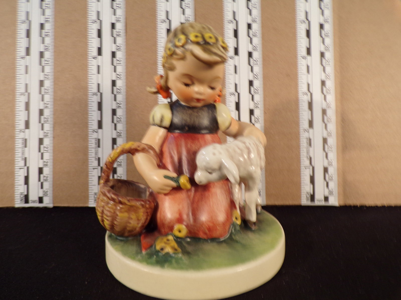 Hummel #361, Trademark # - 3, Figurine Name - Favorite Pet: Up for auction is Hummel #361, Trademark # - 3, Figurine Name - Favorite Pet, This hummel does not have a box and displays these special attributes: None. This Hummel is in excellent condition with no