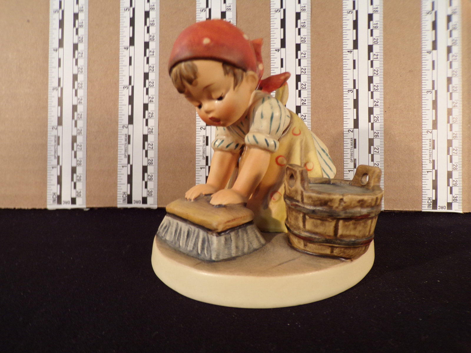 Hummel #363, Trademark # - 5, Figurine Name - Big Housekeeping: Up for auction is Hummel #363, Trademark # - 5, Figurine Name - Big Housekeeping, This hummel does not have a box and displays these special attributes: None. This Hummel is in excellent condition wit