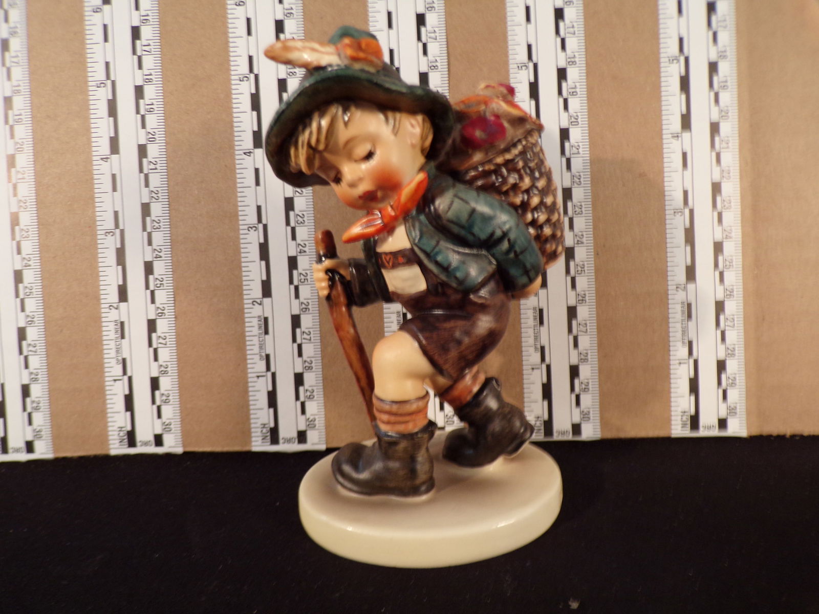 Hummel #381, Trademark # - 5, Figurine Name - Flower Vendor: Up for auction is Hummel #381, Trademark # - 5, Figurine Name - Flower Vendor, This hummel does not have a box and displays these special attributes: None. This Hummel is in excellent condition with n