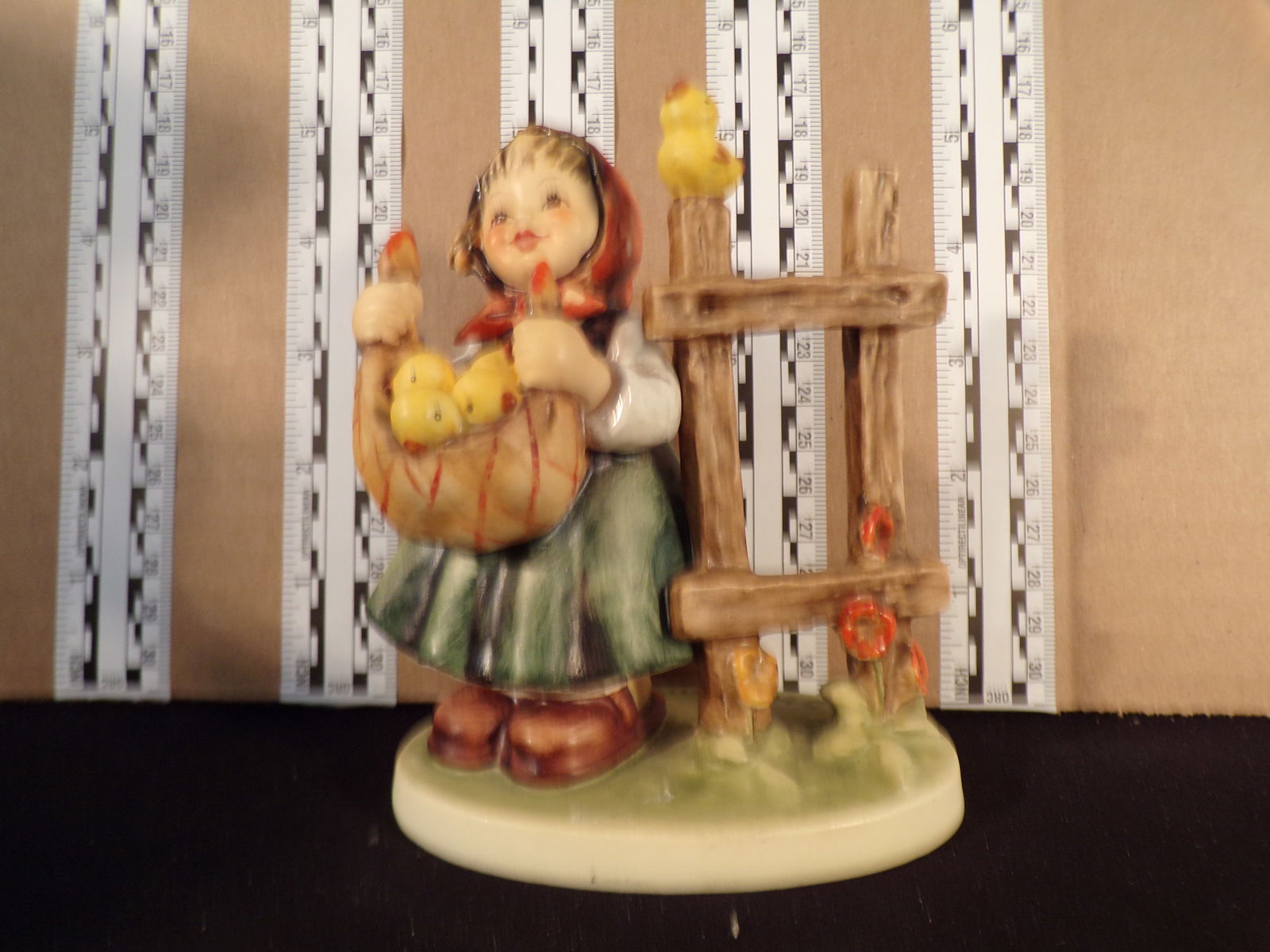 Hummel #385, Trademark # - 4, Figurine Name - Chicken - Lickin: Up for auction is Hummel #385, Trademark # - 4, Figurine Name - Chicken - Lickin, This hummel does not have a box and displays these special attributes: None. This Hummel is in excellent condition wit