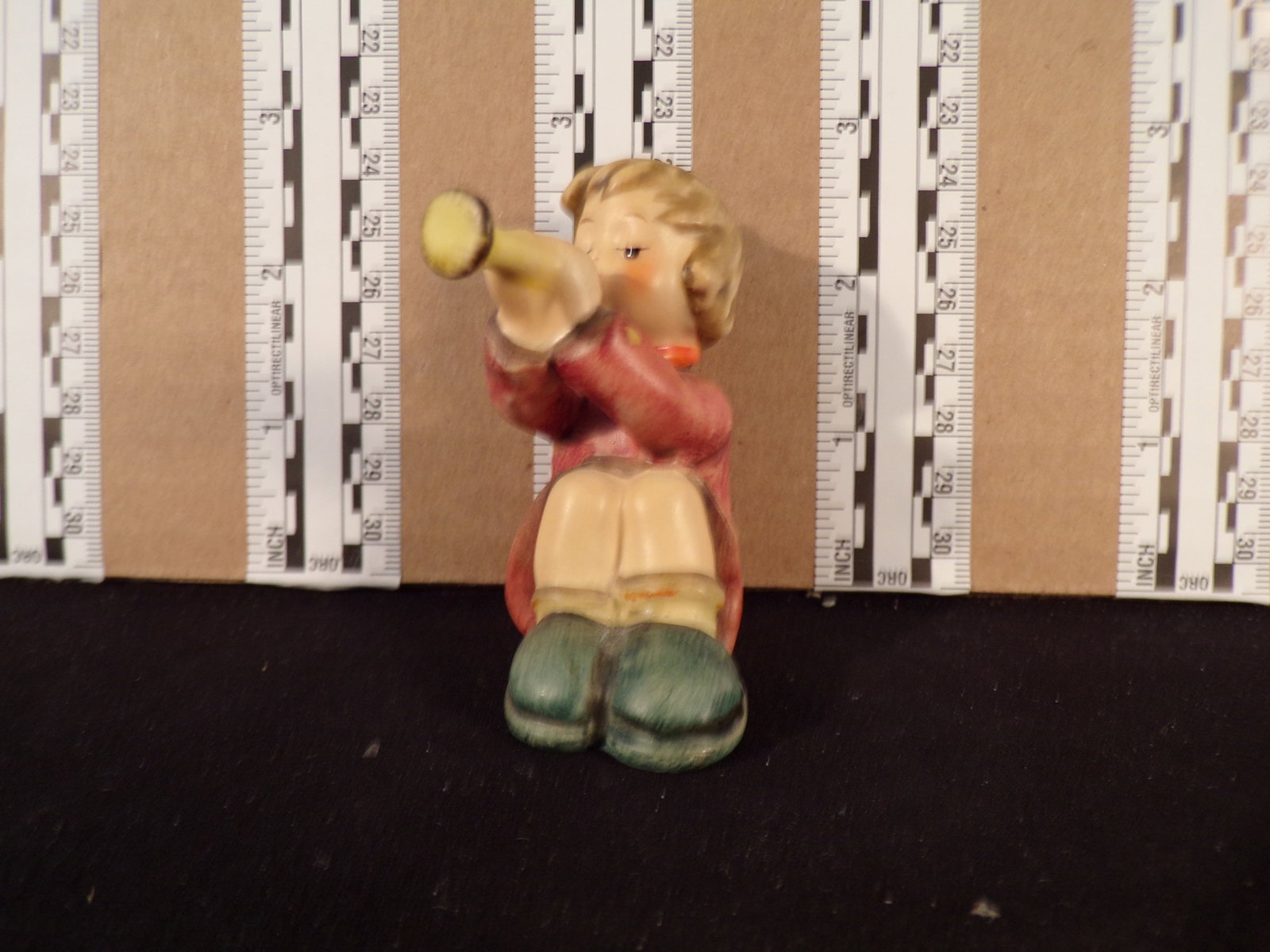 Hummel #391, Trademark # - 4, Figurine Name - Girl With Trumpet: Up for auction is Hummel #391, Trademark # - 4, Figurine Name - Girl With Trumpet, This hummel does not have a box and displays these special attributes: None. This Hummel is in excellent condition wi