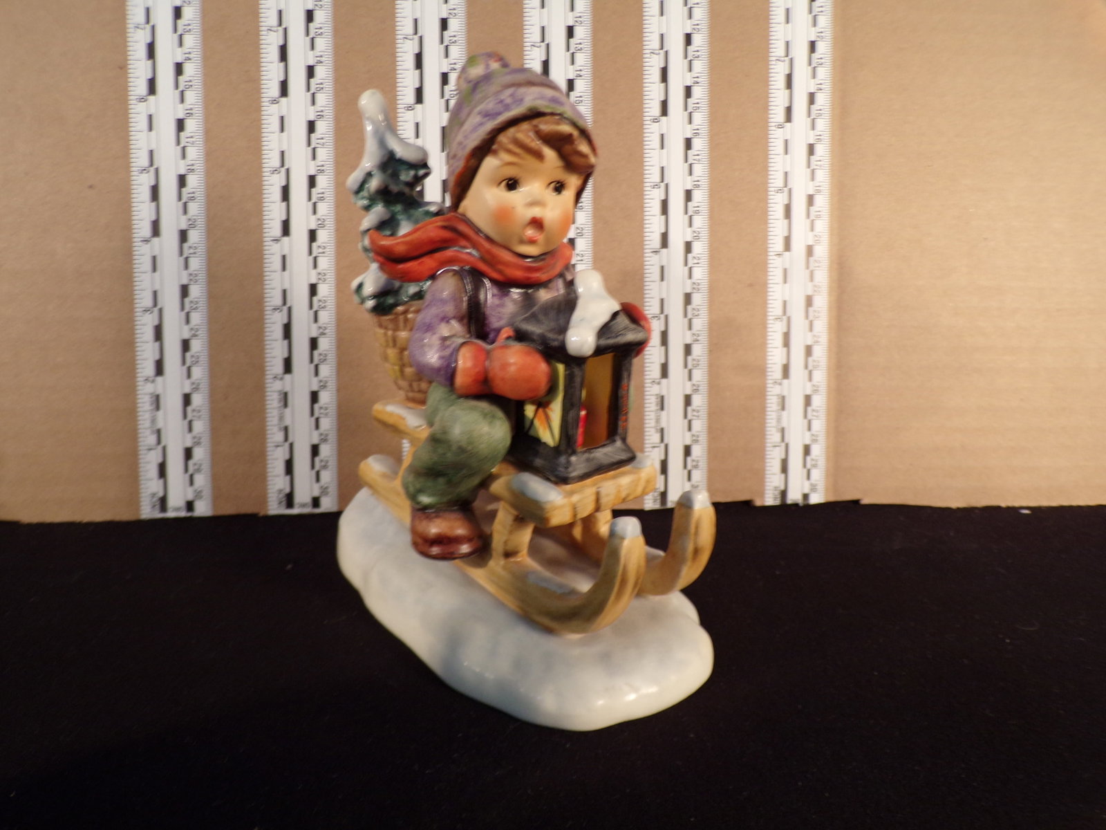 Hummel #396, Size Indicator # - 396/1 Trademark # - 6, Figurine Name - Ride Into Christmas: Up for auction is Hummel #396, Size Indicator - 396/1, Trademark # - 6, Figurine Name - Ride Into Christmas, This hummel does not have a box and displays these special attributes: None. This Hummel is
