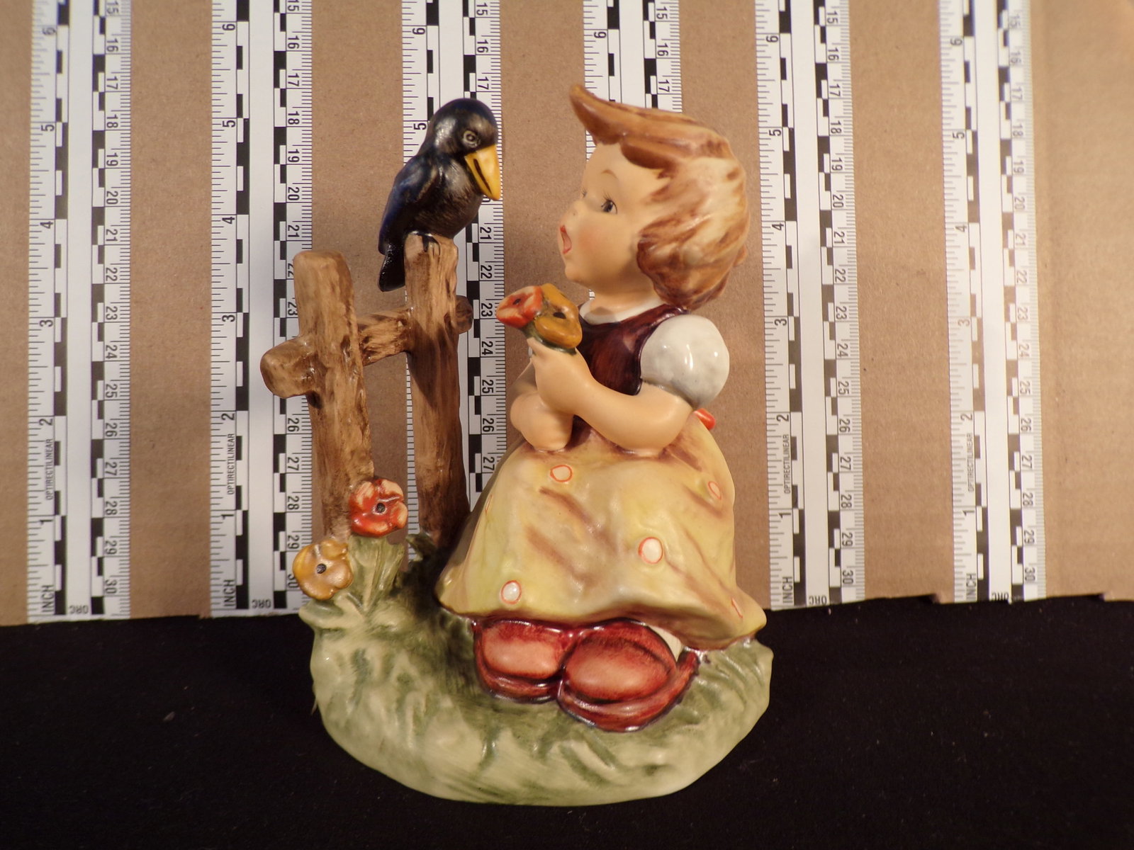 Hummel #405, Trademark # - 6, Figurine Name - Sing With Me: Up for auction is Hummel #405, Trademark # - 6, Figurine Name - Sing With Me, This hummel does have a box and displays these special attributes: None. This Hummel is in excellent condition with no chi