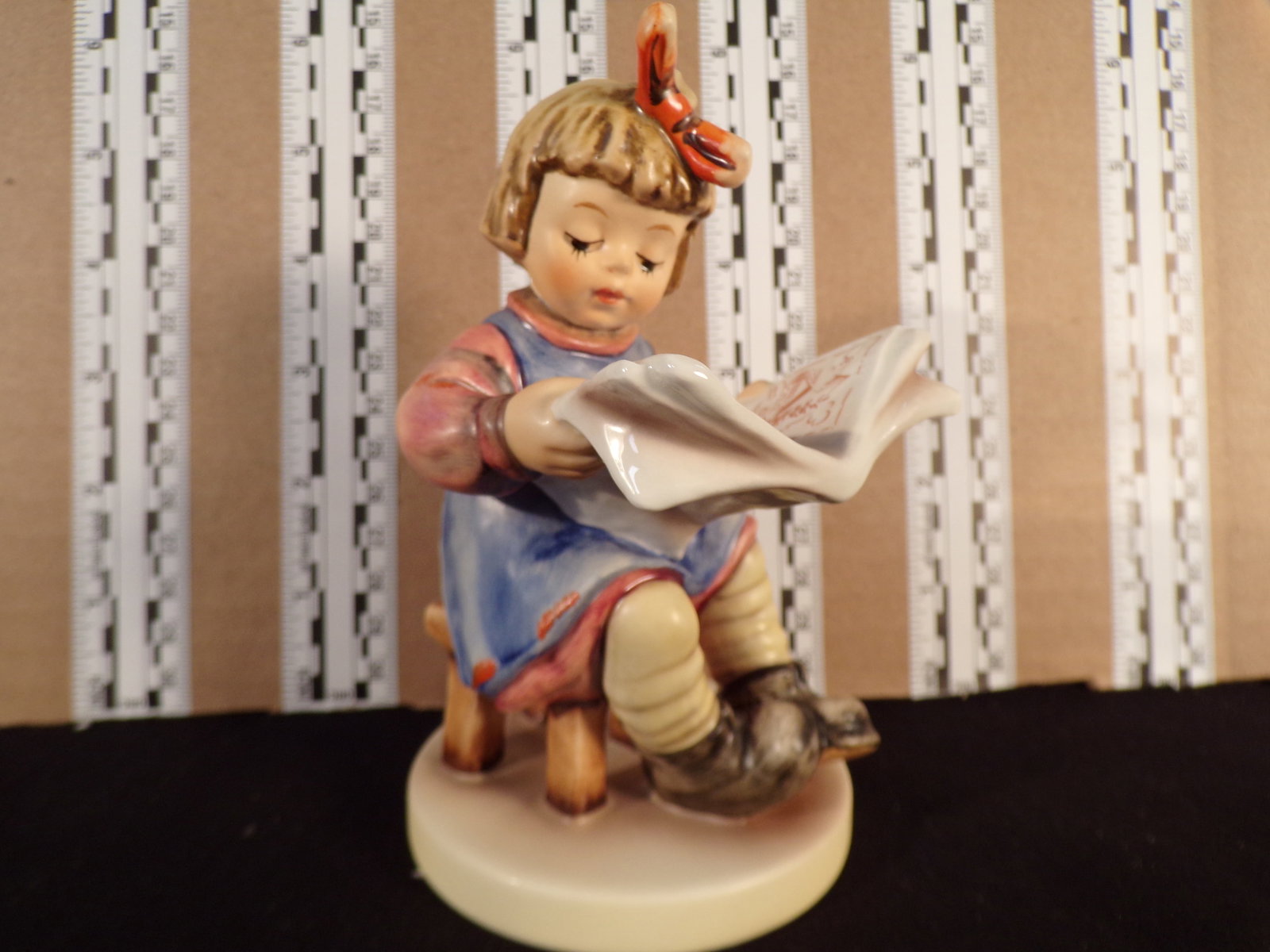 Hummel #418, Trademark # - 6, Figurine Name - What'S New: Up for auction is Hummel #418, Trademark # - 6, Figurine Name - What'S New, This hummel does have a box and displays these special attributes: None. This Hummel is in excellent condition with no chips