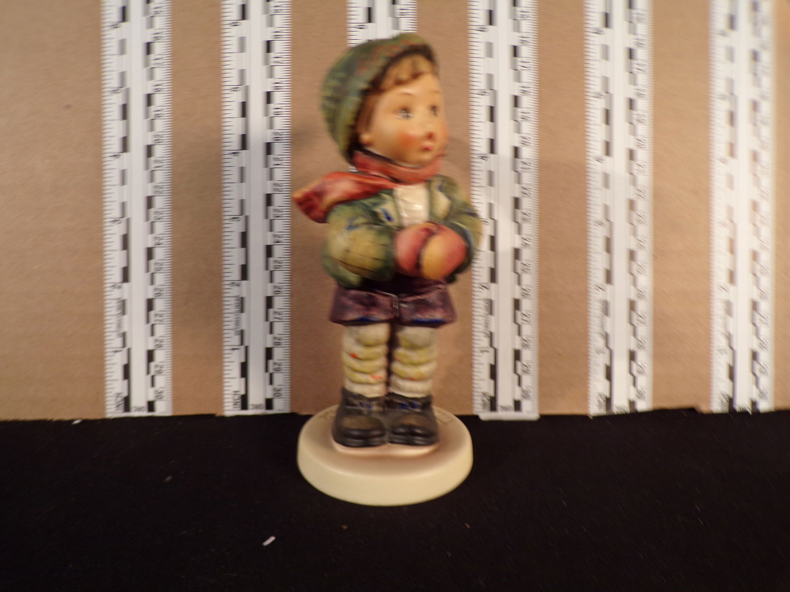 Hummel #421, Trademark # - 6, Figurine Name - It'S Cold: Up for auction is Hummel #421, Trademark # - 6, Figurine Name - It'S Cold, This hummel does not have a box and displays these special attributes: Special Edition #6 Goebel Collectors Club. This Hummel