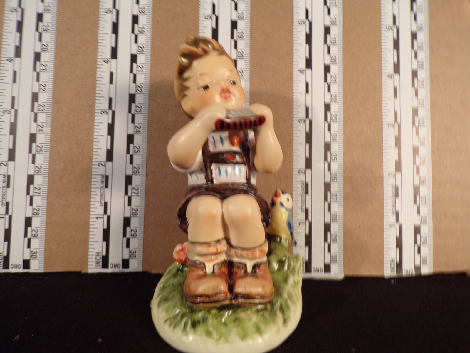 Hummel #430, Trademark # - 6, Figurine Name - In D Major: Up for auction is Hummel #430, Trademark # - 6, Figurine Name - In D Major, This hummel does not have a box and displays these special attributes: None. This Hummel is in excellent condition with no c