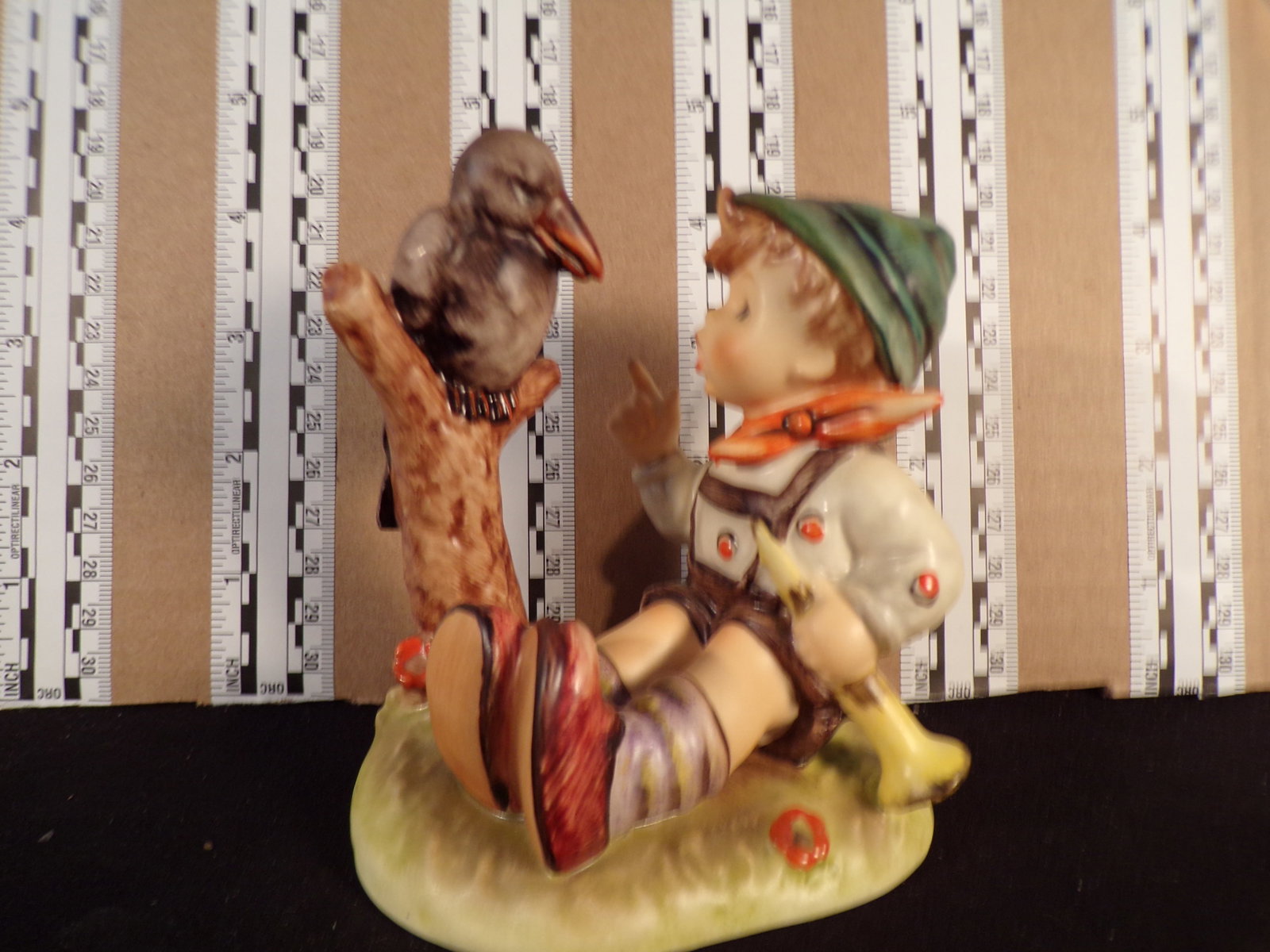 Hummel #433, Trademark # - 6, Figurine Name - Sing Along: Up for auction is Hummel #433, Trademark # - 6, Figurine Name - Sing Along, This hummel does not have a box and displays these special attributes: None. This Hummel is in excellent condition with no c