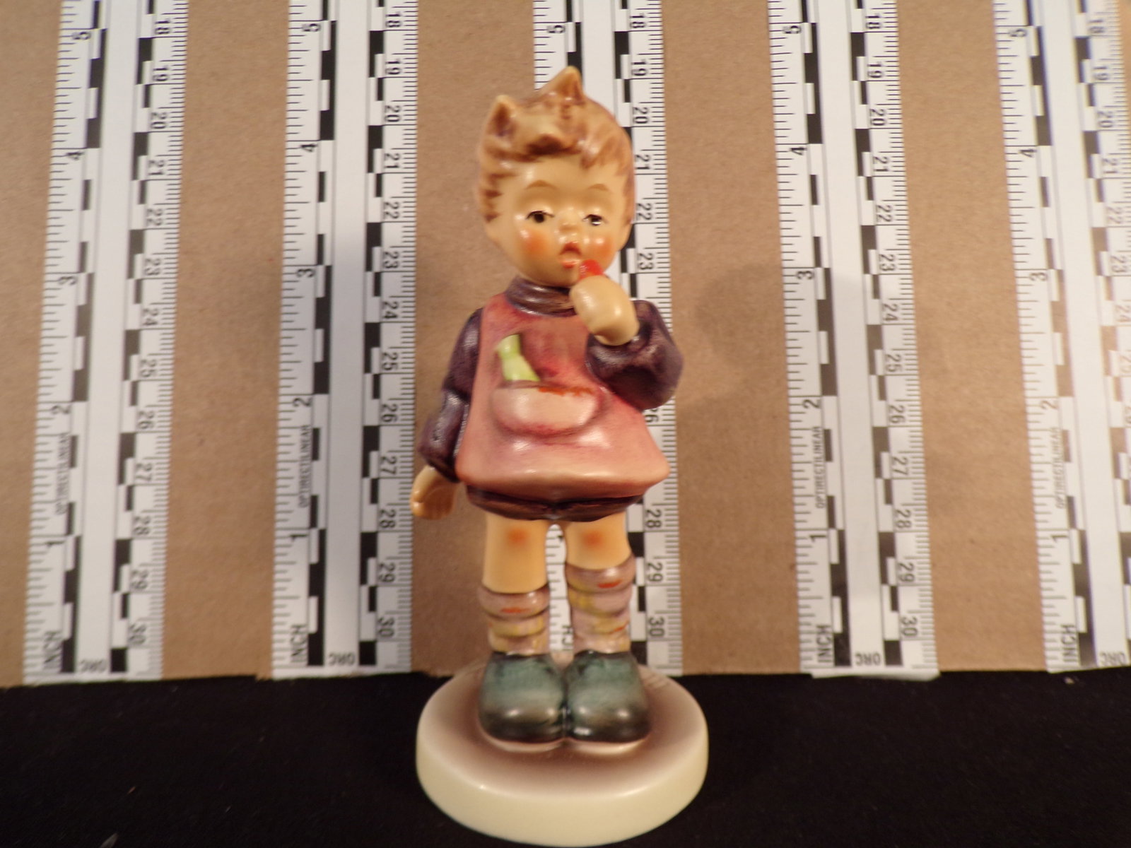 Hummel #435, Size Indicator # - 435 3/0 Trademark # - 7, Figurine Name - Delicious: Up for auction is Hummel #435, Size Indicator - 435 3/0, Trademark # - 7, Figurine Name - Delicious, This hummel does have a box and displays these special attributes: None. This Hummel is in excellen