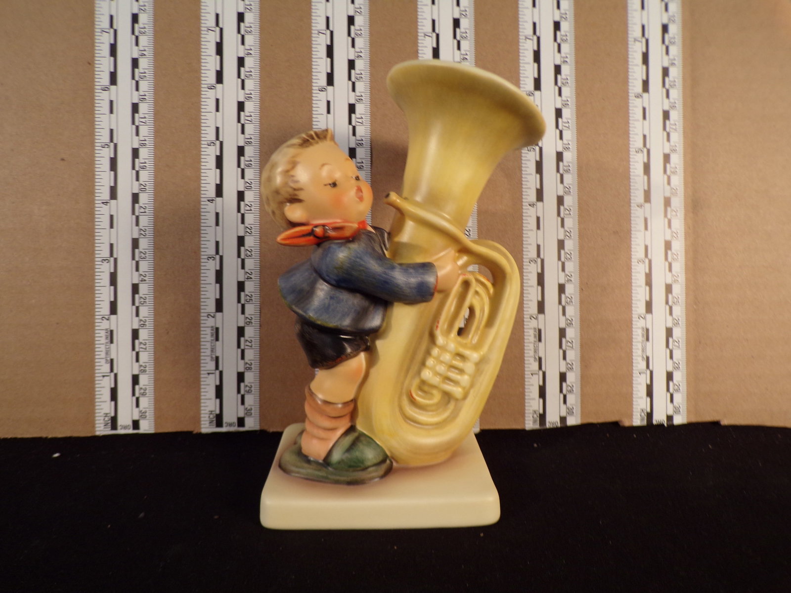 Hummel #437, Trademark # - 8, Figurine Name - Tuba Player: Up for auction is Hummel #437, Trademark # - 8, Figurine Name - Tuba Player, This hummel does have a box and displays these special attributes: None. This Hummel is in excellent condition with no chip