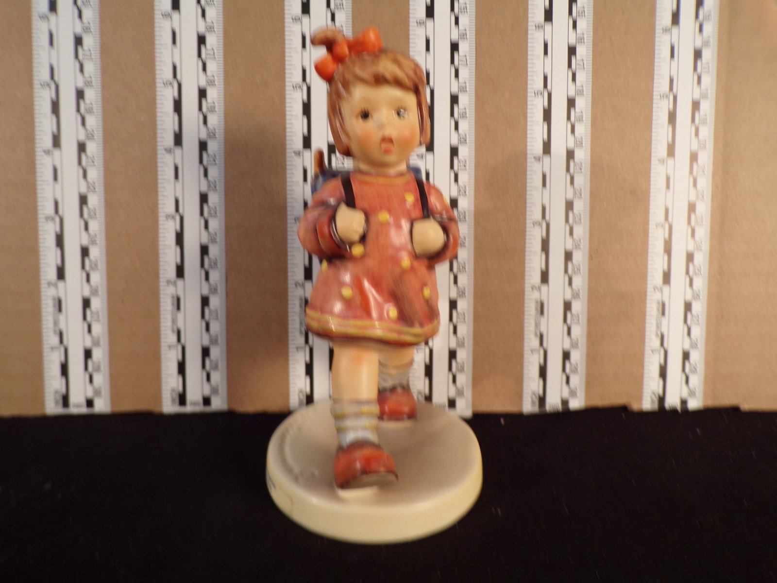 Hummel #467, Trademark # - 6, Figurine Name - The Kindergartner: Up for auction is Hummel #467, Trademark # - 6, Figurine Name - The Kindergartner, This hummel does not have a box and displays these special attributes: None. This Hummel is in excellent condition wi