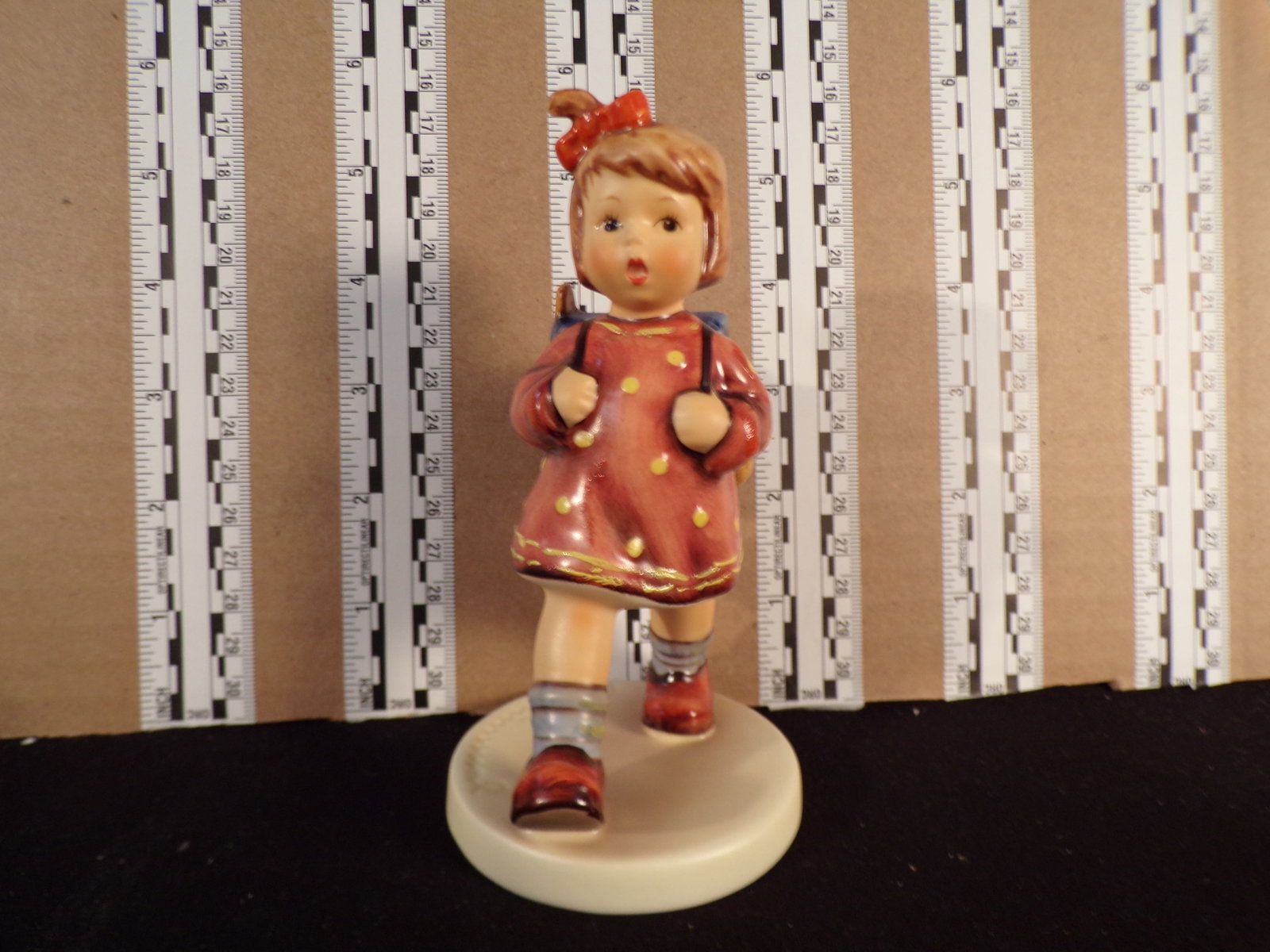 Hummel #467, Trademark # - 6, Figurine Name - The Kindergartner: Up for auction is Hummel #467, Trademark # - 6, Figurine Name - The Kindergartner, This hummel does have a box and displays these special attributes: None. This Hummel is in excellent condition with n