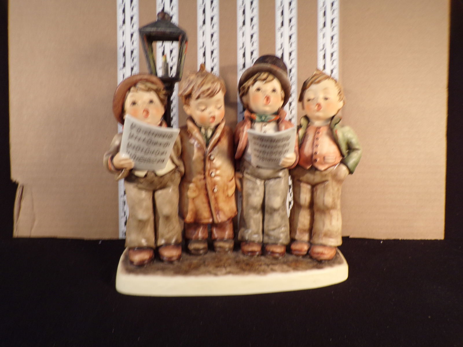 Hummel #471, Trademark # - 6, Figurine Name - Harmony In 4 Parts: Up for auction is Hummel #471, Trademark # - 6, Figurine Name - Harmony In 4 Parts, This hummel does have a box and displays these special attributes: None. This Hummel is in excellent condition with