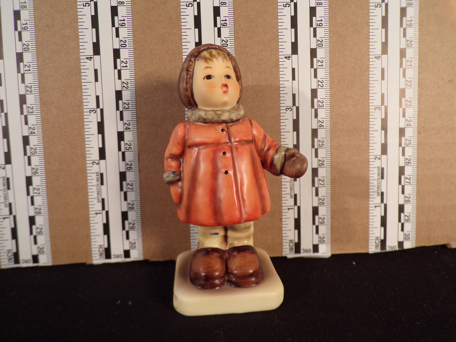 Hummel #476, Trademark # - 6, Figurine Name - Winter Song: Up for auction is Hummel #476, Trademark # - 6, Figurine Name - Winter Song, This hummel does not have a box and displays these special attributes: None. This Hummel is in excellent condition with no 