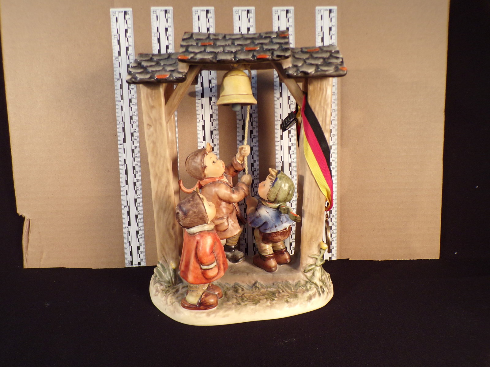 Hummel #487, Trademark # - 6, Figurine Name - Let'S Tell The World: Up for auction is Hummel #487, Trademark # - 6, Figurine Name - Let'S Tell The World, This hummel does have a box and displays these special attributes: None. This Hummel is in excellent condition wit