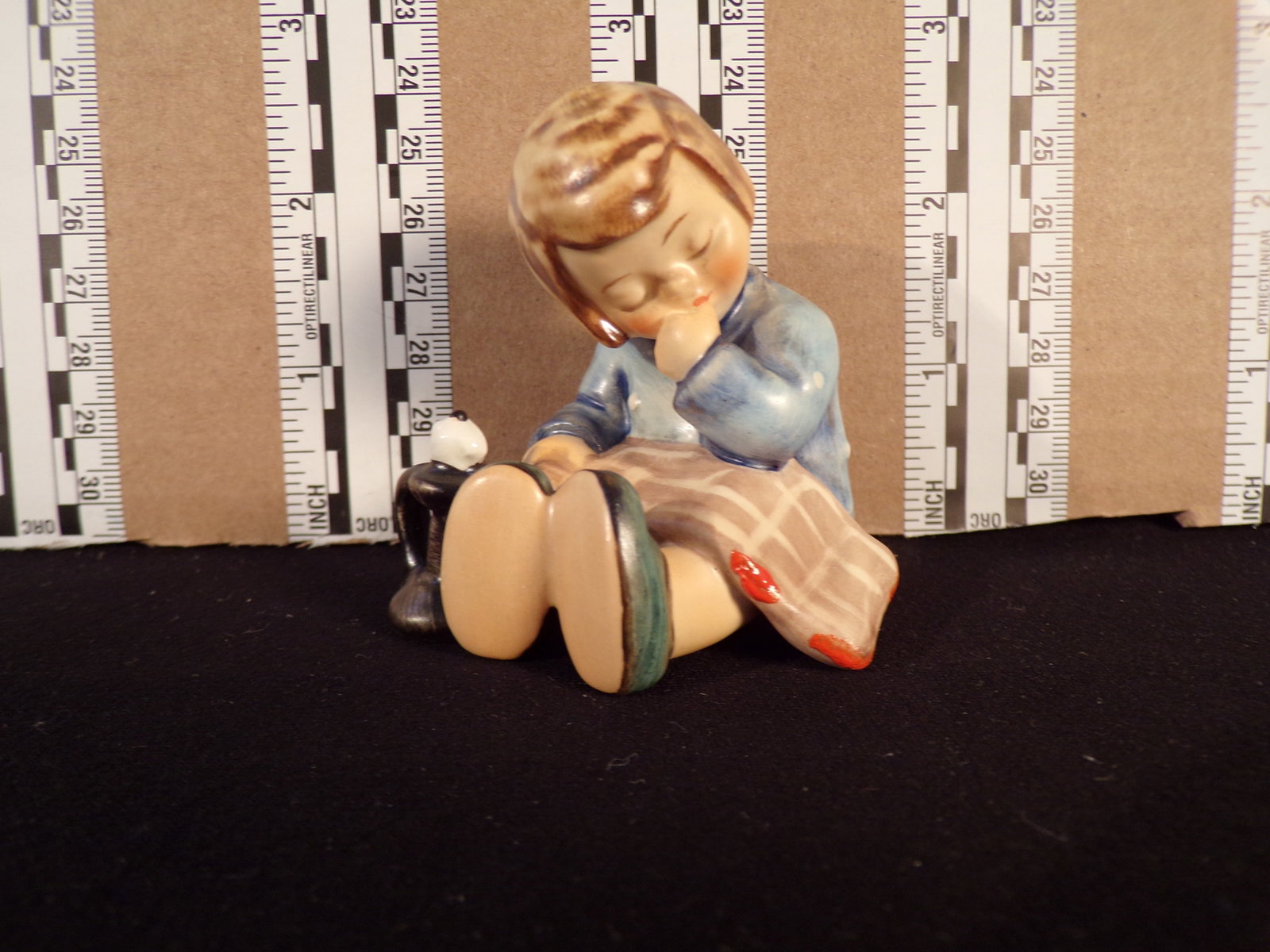 Hummel #534, Trademark # - 6, Figurine Name - A Nap: Up for auction is Hummel #534, Trademark # - 6, Figurine Name - A Nap, This hummel does have a box and displays these special attributes: None. This Hummel is in excellent condition with no chips or c