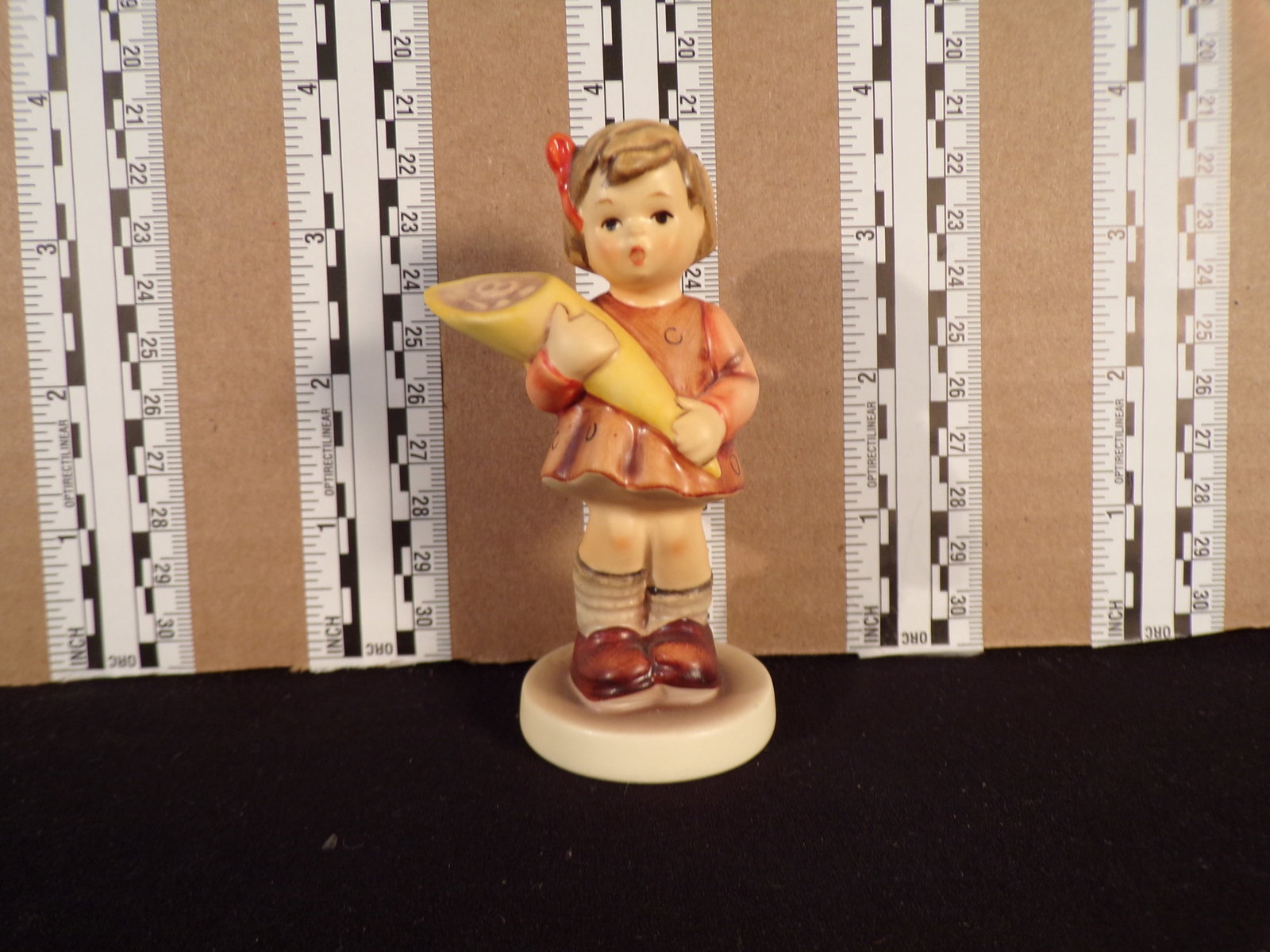 Hummel #549, Size Indicator # - 549 3/0 Trademark # - 7, Figurine Name - A Sweet Offering: Up for auction is Hummel #549, Size Indicator - 549 3/0, Trademark # - 7, Figurine Name - A Sweet Offering, This hummel does not have a box and displays these special attributes: M.I. Hummel Club 1993