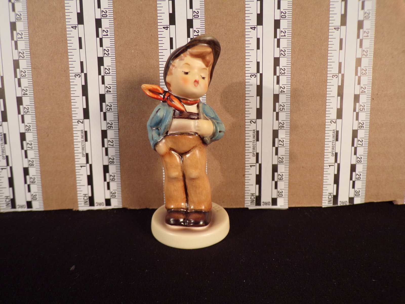Hummel #560, Trademark # - 7, Figurine Name - Lucky Fellow: Up for auction is Hummel #560, Trademark # - 7, Figurine Name - Lucky Fellow, This hummel does not have a box and displays these special attributes: M.I. Hummel Club 1992/93. This Hummel is in excelle