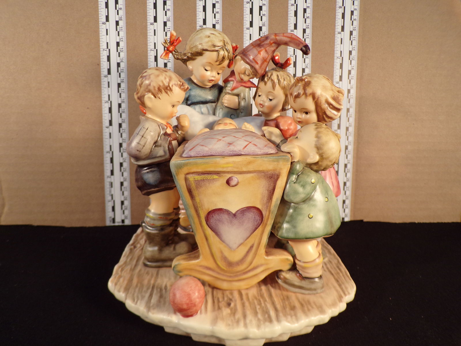 Hummel #574,  Trademark # - 7, Figurine Name - Rock-A-Bye (1 of 5)