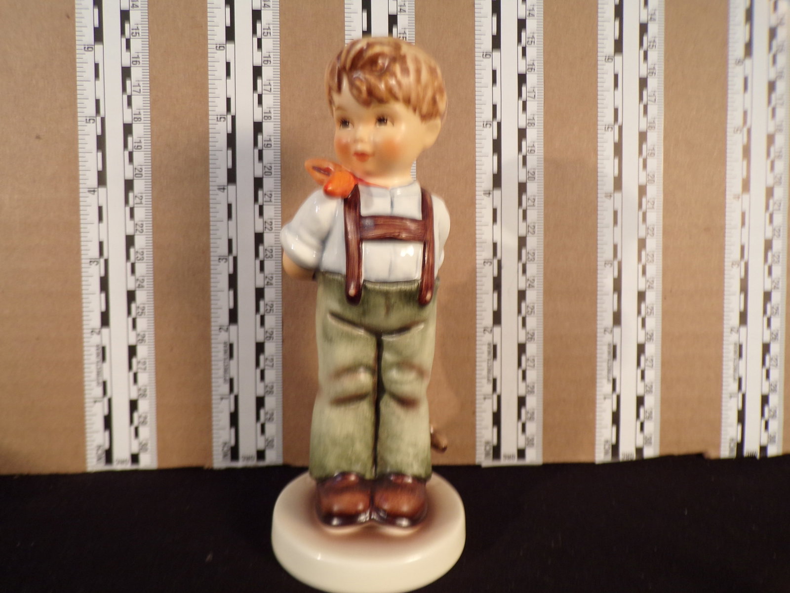 Hummel #626, Trademark # - 7, Figurine Name - I Didn'T Do It: Up for auction is Hummel #626, Trademark # - 7, Figurine Name - I Didn'T Do It, This hummel does have a box and displays these special attributes: None. This Hummel is in excellent condition with no c