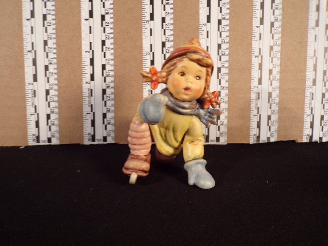 Hummel #2058, Size Indicator # - 2058 a Trademark # - 8, Figurine Name - Skating Lesson: Up for auction is Hummel #2058, Size Indicator - 2058 a, Trademark # - 8, Figurine Name - Skating Lesson, This hummel does not have a box and displays these special attributes: First Issue 2000 Backst