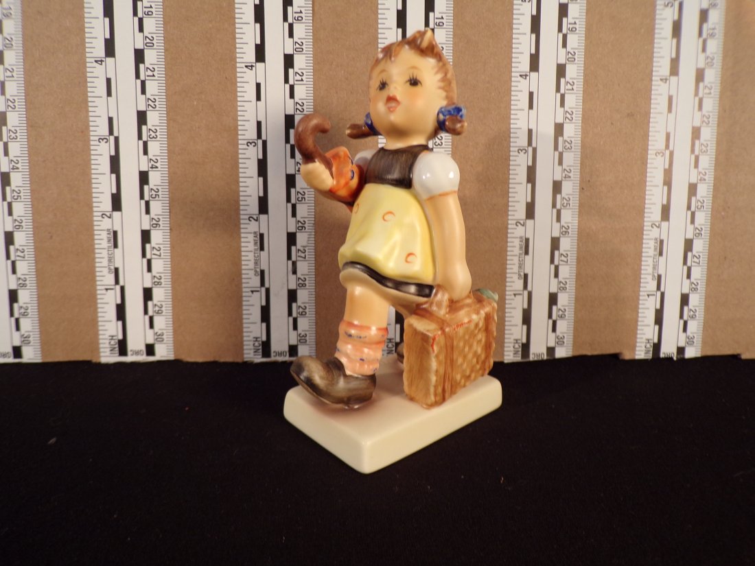 Hummel #2059, Trademark # - 8, Figurine Name - Merry Wanderess: Up for auction is Hummel #2059, Trademark # - 8, Figurine Name - Merry Wanderess, This hummel does have a box and displays these special attributes: None. This Hummel is in excellent condition with no
