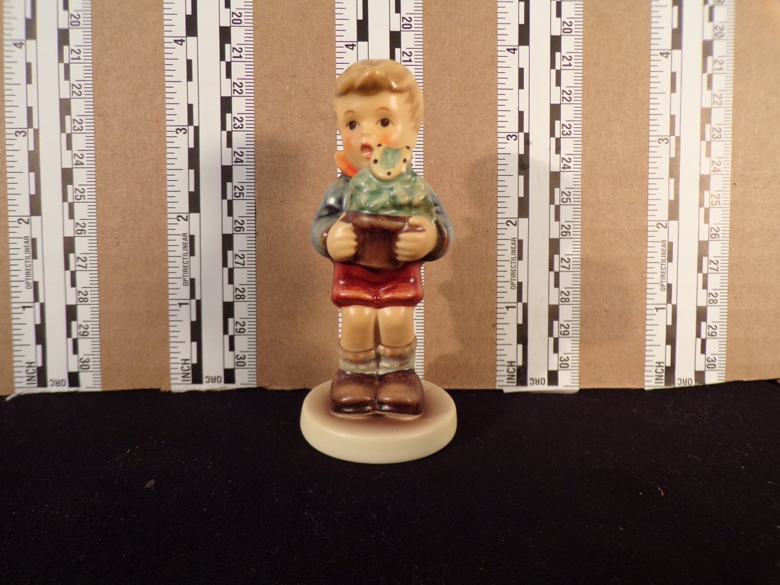 Hummel #2071, Trademark # - 7, Figurine Name - Lucky Charmer: Up for auction is Hummel #2071, Trademark # - 7, Figurine Name - Lucky Charmer, This hummel does have a box and displays these special attributes: None. This Hummel is in excellent condition with no c