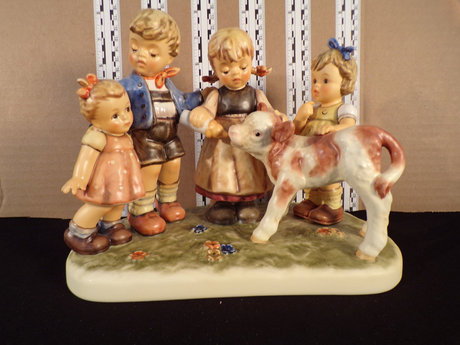 Hummel #2165, Trademark # - 8, Figurine Name - Farm Days: Up for auction is Hummel #2165, Trademark # - 8, Figurine Name - Farm Days, This hummel does have a box and displays these special attributes: None. This Hummel is in excellent condition with no chips