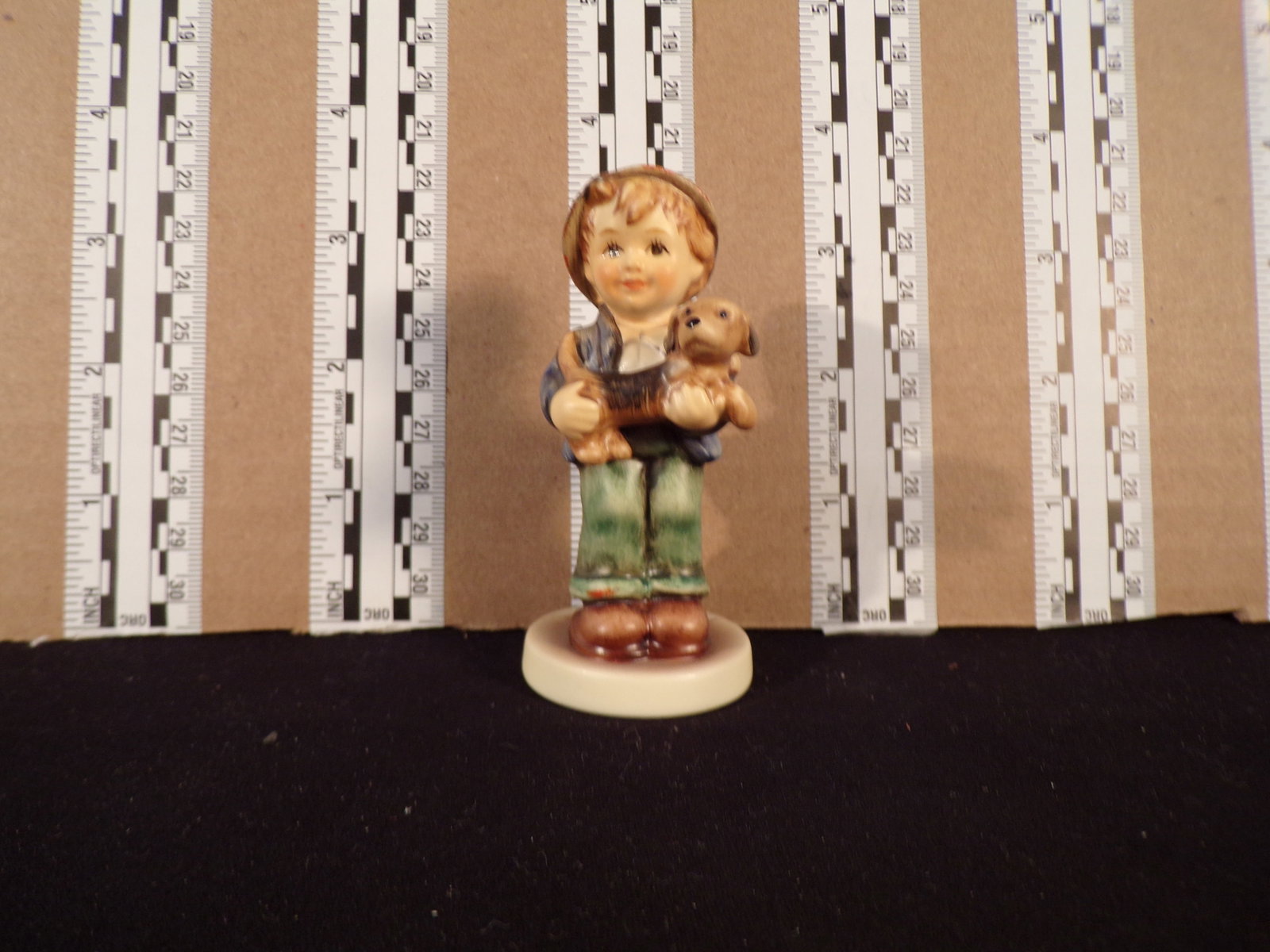 Hummel #2229, Trademark # - 8, Figurine Name - Puppy Pal: Up for auction is Hummel #2229, Trademark # - 8, Figurine Name - Puppy Pal, This hummel does have a box and displays these special attributes: None. This Hummel is in excellent condition with no chips