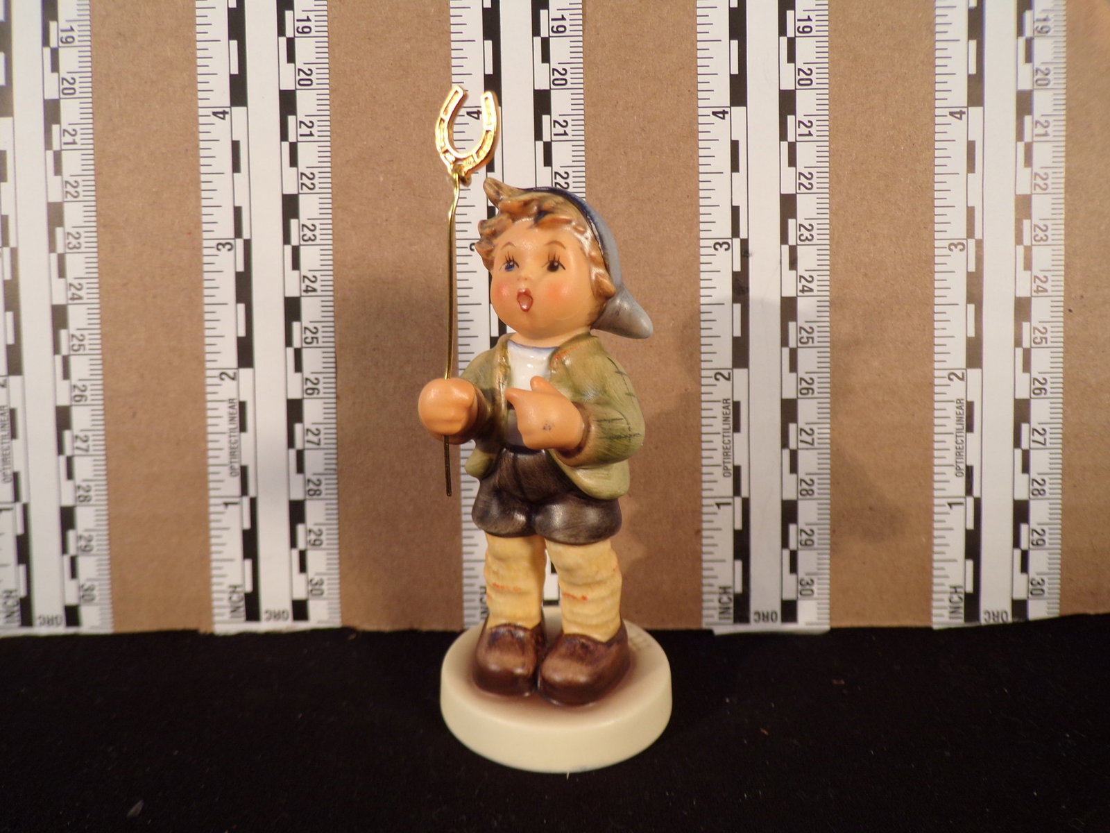 Hummel #2296, Trademark # - 9, Figurine Name - Little Luck: Up for auction is Hummel #2296, Trademark # - 9, Figurine Name - Little Luck, This hummel does have a box and displays these special attributes: None. This Hummel is in excellent condition with no chi