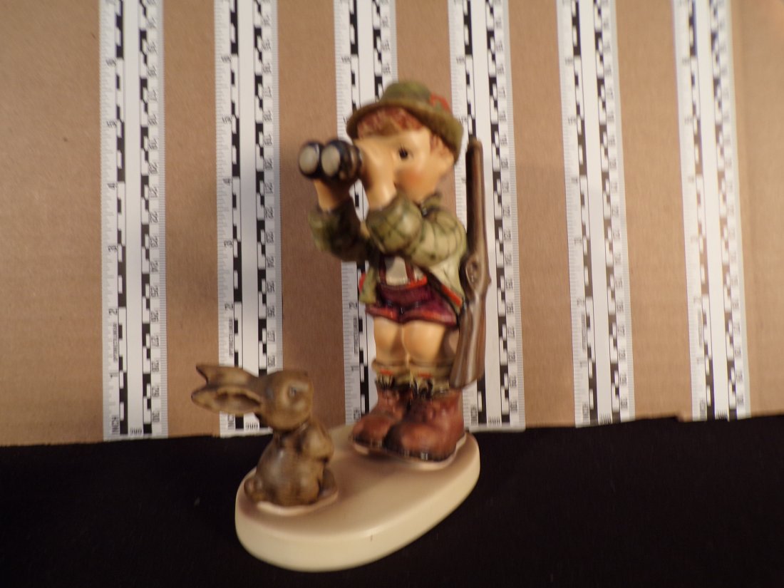 Hummel #307, Trademark # - 6, Figurine Name - Good Hunting: Up for auction is Hummel #307, Trademark # - 6, Figurine Name - Good Hunting, This hummel does not have a box and displays these special attributes: None. This Hummel is in excellent condition with no