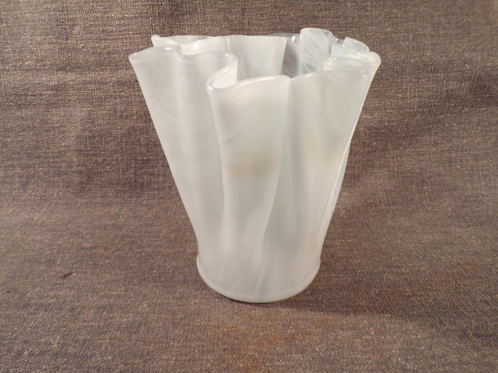 Vintage Freeform Folded White Opaline Art Glass Napkin Vase: Vintage Freeform Folded White Opaline Art Glass Napkin Vase. This Vase is in Excellent Condition with no chips or cracks. It measures 6" tall and 5 1/4" in diameter. Fantastic overlapping folding of t