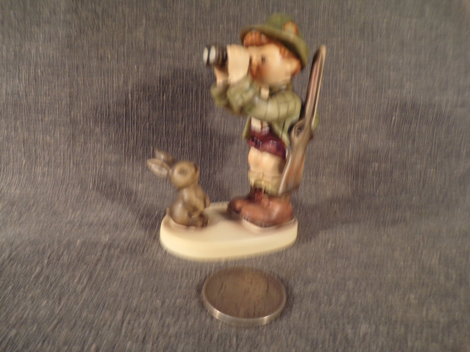 Hummel #307, Size Indicator - none, Trademark # - 4, Figurine Name - Good Hunting.: Up for auction is Hummel #307, Size Indicator - none, Trademark # - 4, Figurine Name - Good Hunting. This hummel does not have a box and displays these special attributes: None. This Hummel is in exce