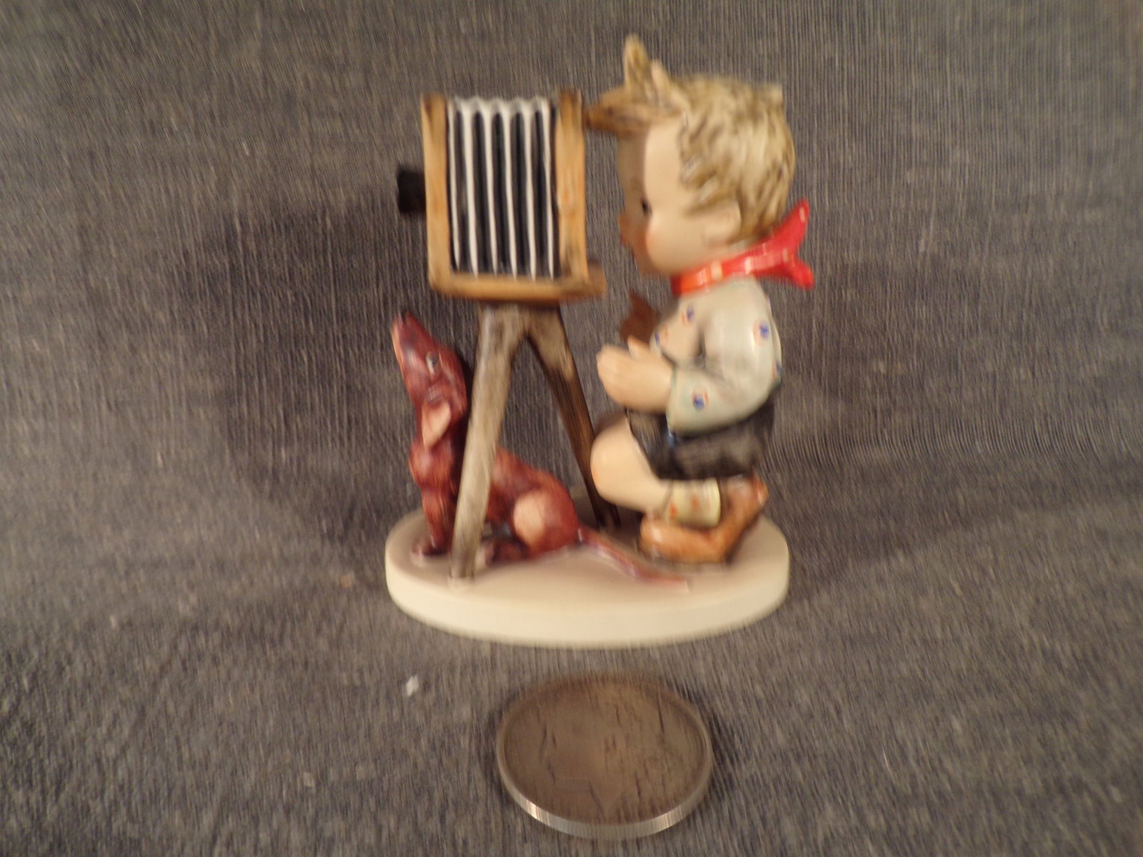 Hummel #178, Size Indicator - none, Trademark # - 4, Figurine Name - The Photographer.: Up for auction is Hummel #178, Size Indicator - none, Trademark # - 4, Figurine Name - The Photographer. This hummel does not have a box and displays these special attributes: None. This Hummel is in 