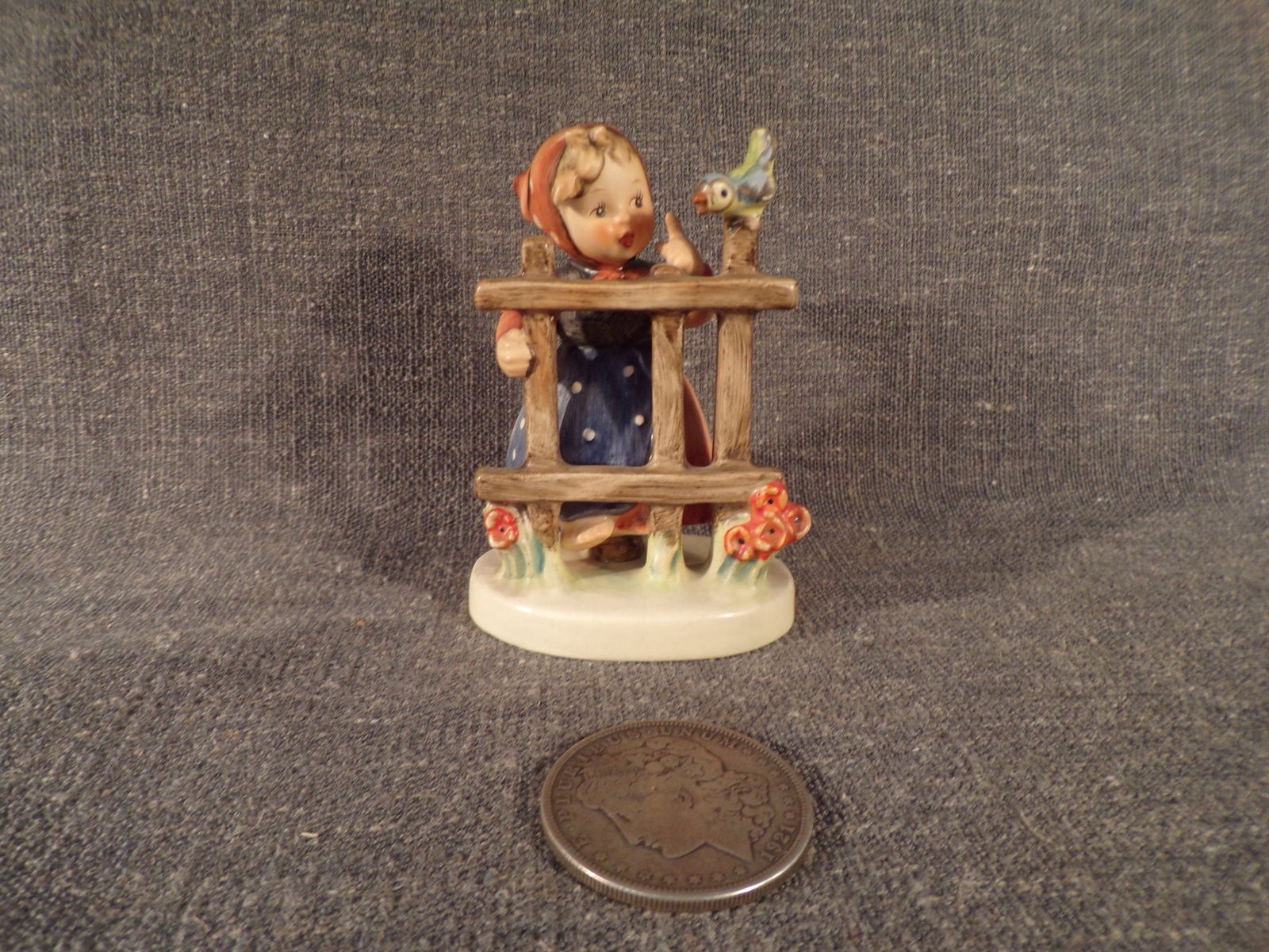 Hummel #203, Size Indicator - 203/2/0, Trademark # - 3, Figurine Name - Signs of Spring.: Up for auction is Hummel #203, Size Indicator - 203/2/0, Trademark # - 3, Figurine Name - Signs of Spring. This hummel does not have a box and displays these special attributes: None. This Hummel is i