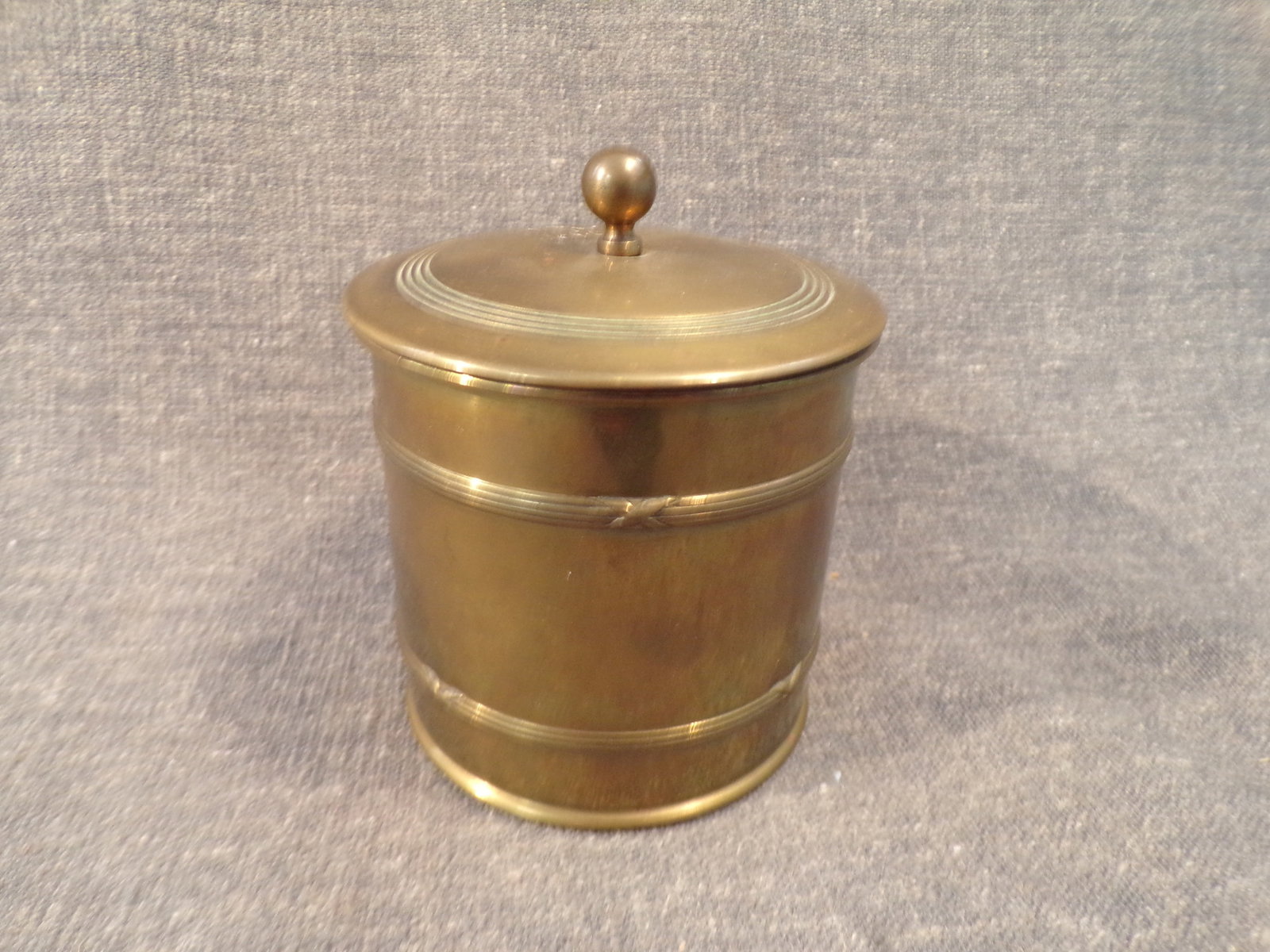 Antique Art Nouveau Brass Tobacco Humidor - Germany: Antique Art Nouveau Brass Tobacco Humidor - Germany. This Brass Germany Humidor is in Very Good condition with no dents. It measures 4" tall and 3 1/2" in diameter. Marked "Germany" on the base as pic