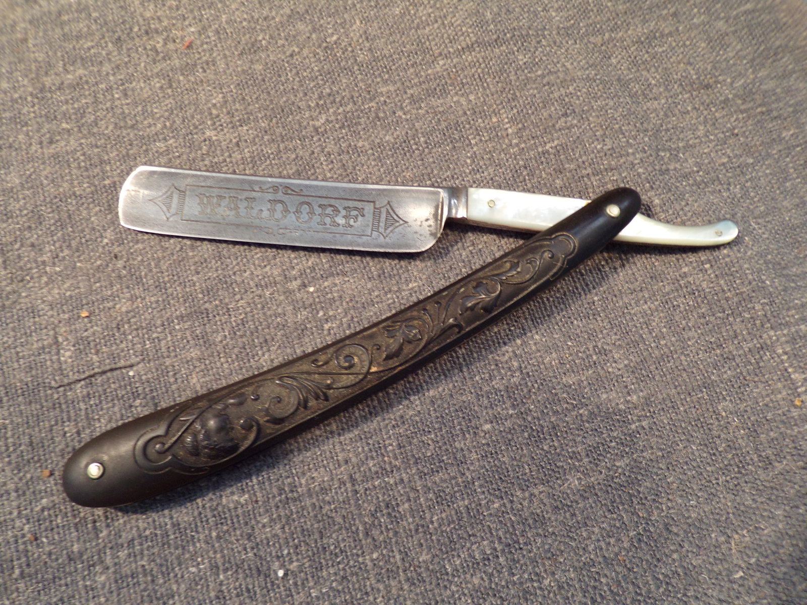 Antique H. Boker Waldorf Straight Razor - Mother of Pearl Tang - Fancy Scales -GERMANY: Antique H. Boker Waldorf Straight Razor - Mother of Pearl Tang - Fancy Scales -GERMANY. This Boker Straight Razor is in Good or better condition as pictured. The blade measures 21/32" wide. Etched "Wa