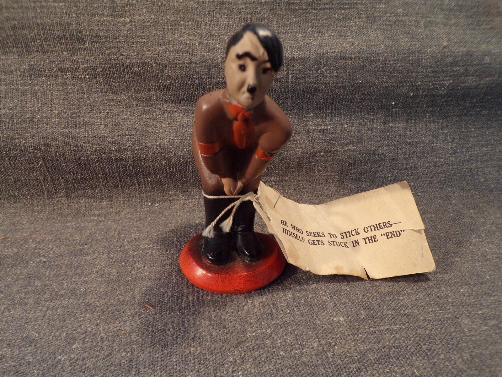 Vintage WW2 Adolf Hitler Figurine Pin Cushion with Original Tag.: Vintage WW2 Adolf Hitler Figurine Pin Cushion with Original Hotzi Notzi Tag. This Figurine Pin Cushion is in good or much better condition as pictured. Marked on the base "Pat Pending 1941 CPE" as pic