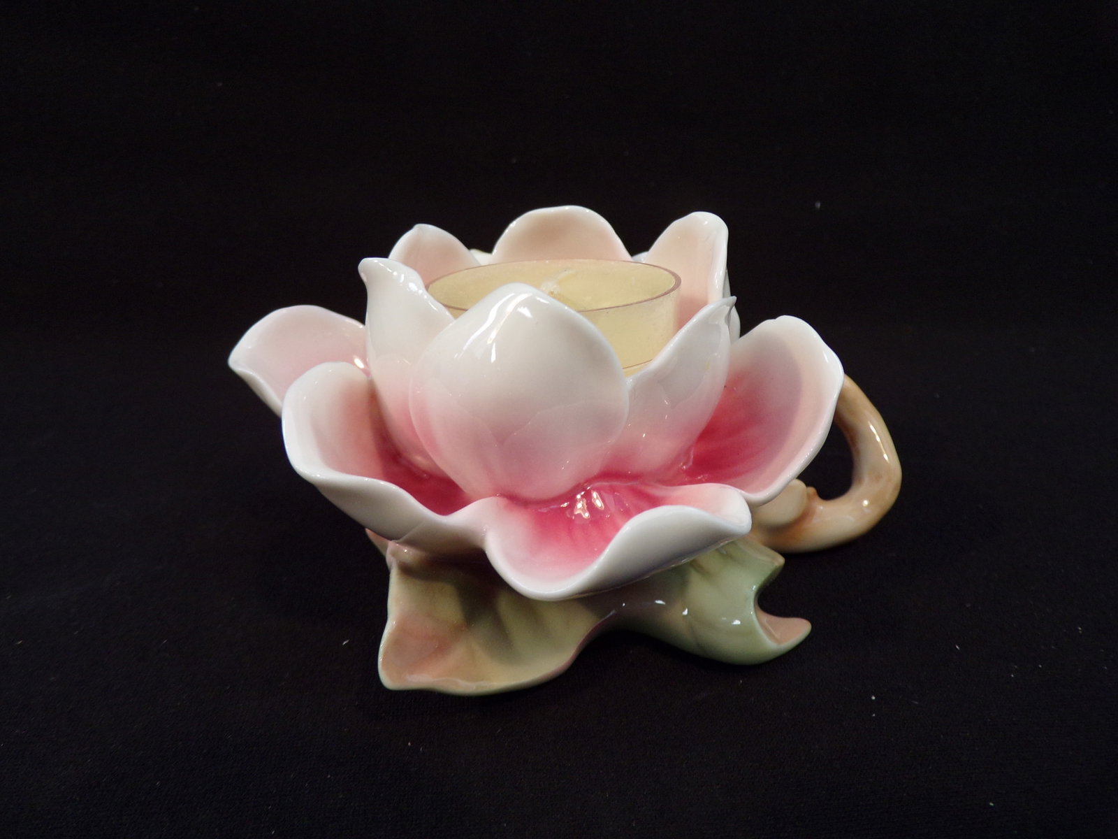 Vintage Franz Porcelain: Magnolia Design Sculptured porcelain Candle and Tea Lite Holder: Vintage Franz Porcelain: Magnolia Design Sculptured Porcelain Candle and Tea Lite Holder. Model #: FZ00527. Measurements: N/A. This Vintage Franz Porcelain item is New Old Stock and is in Excellent Co