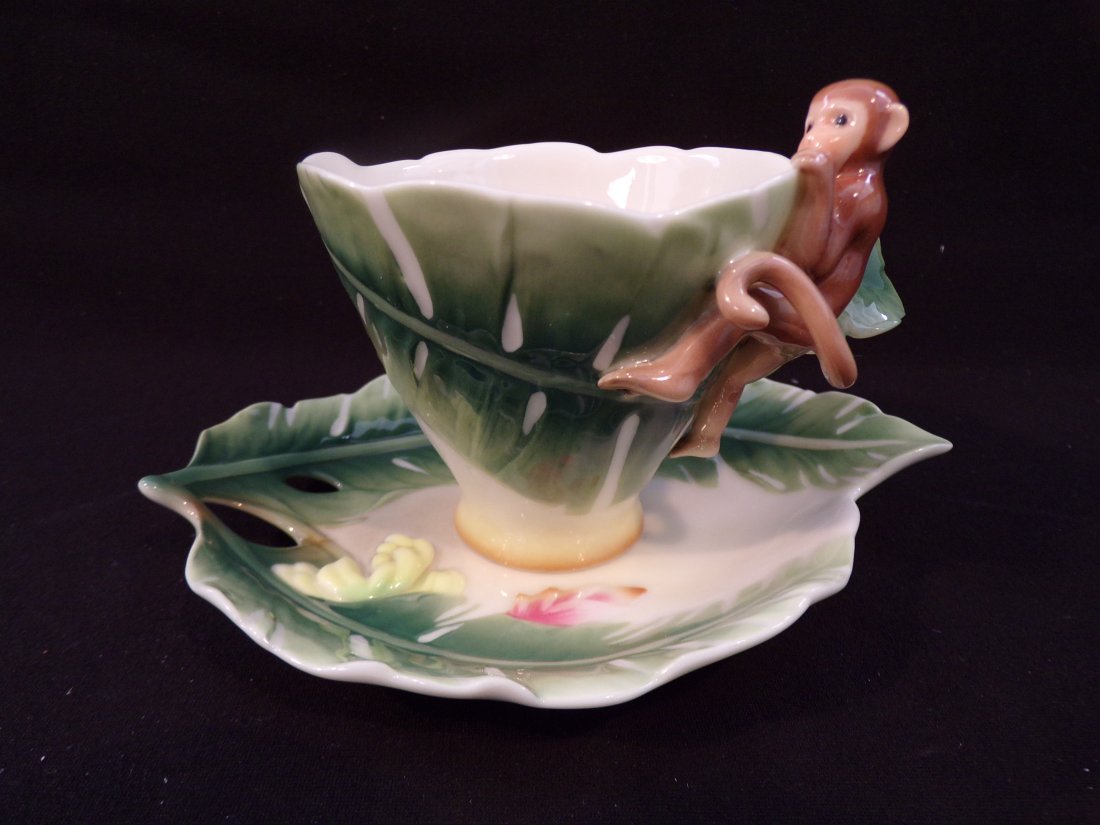 Vintage Franz Porcelain: Monkey Design Sculptured Porcelain Cup & Saucer Set: Vintage Franz Porcelain: Monkey Design Sculptured Porcelain Cup & Saucer Set. Model #: FZ00106. Measurements: N/A. This Vintage Franz Porcelain item is New Old Stock and is in Excellent Condition as p