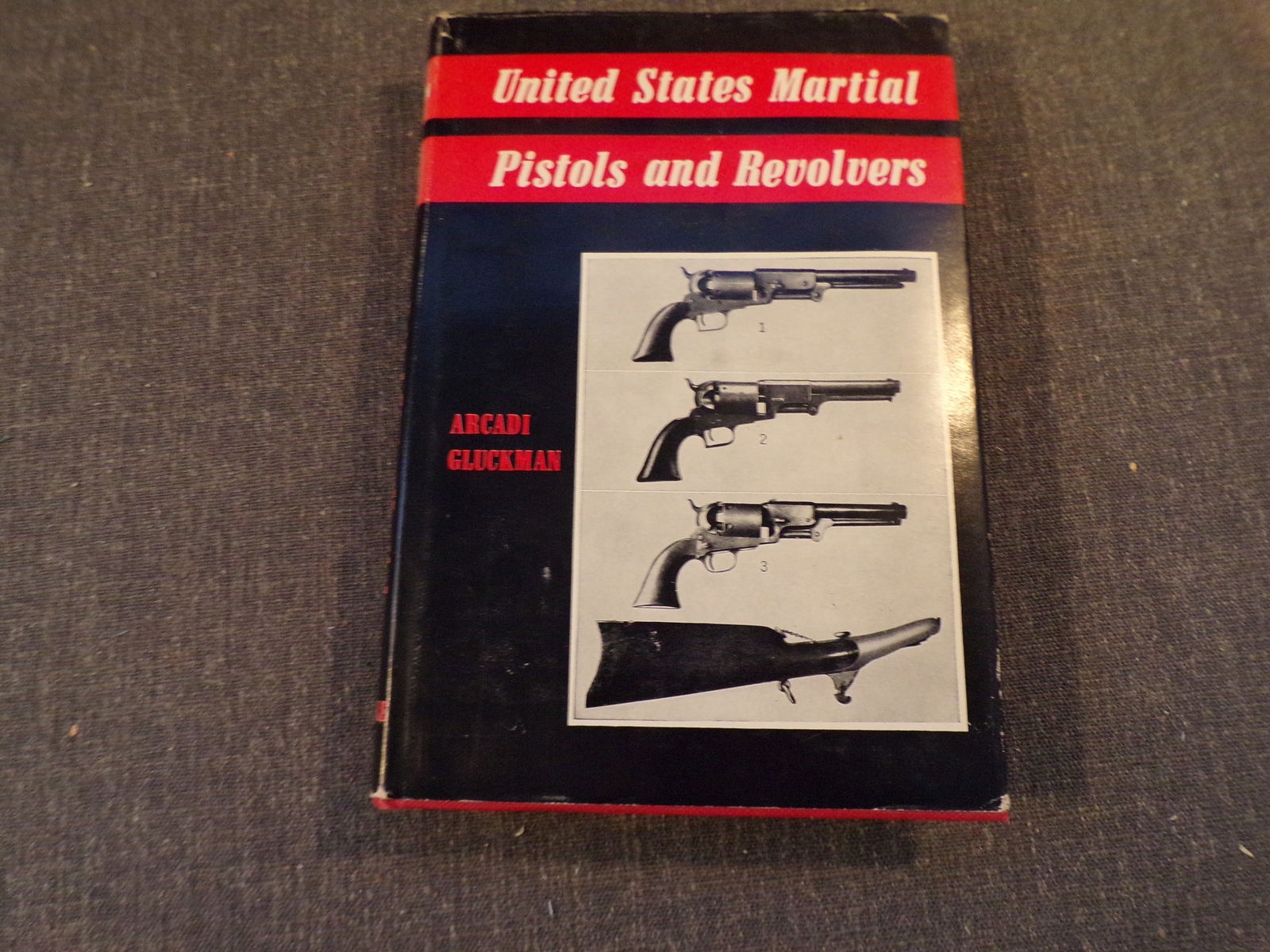 1956 3rd Printing UNITED STATES MARTIAL PISTOLS AND REVOLVERS by Arcadi Gluckman: 1956 3rd Printing UNITED STATES MARTIAL PISTOLS AND REVOLVERS by Arcadi Gluckman - Published by Telegraph Press, Harrisburg, PA, 1956. HC w/DJ. This Book is in Very Good Condition as pictured. Dust Ja