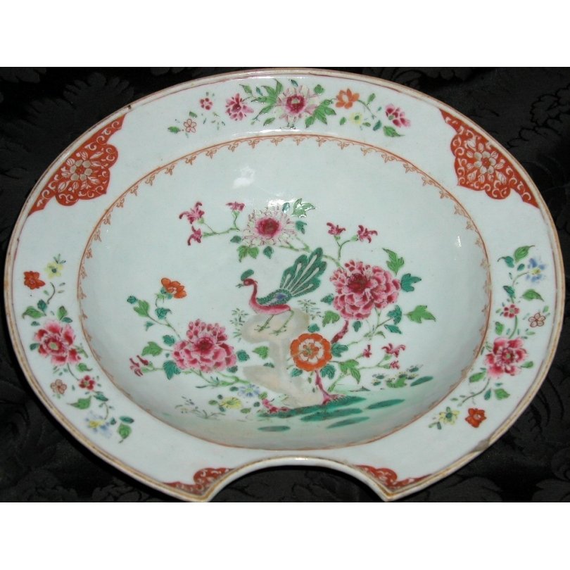 18th century famille verte Oval shaving dish decorated with a peacock.: Oval shaving dish, porcelain. With decoration of a peacock on a rock surrounded by peonies as the central scene and groups of flowers on the lip. China. 18th century.Origin: ChinaPeriod: 18th century,