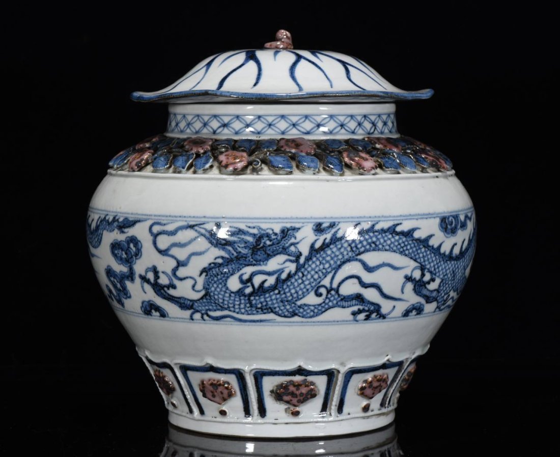 Yuan blue and white underglaze red carved dragon pattern lotus leaf jar (1 of 9)