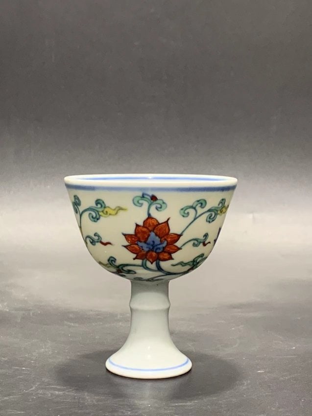 Ming Cheng Hua Dou Cai goblet with entwined branches and lotus pattern: Ming Cheng Hua Dou Cai goblet with entwined branches and lotus pattern. Height 8.5 cm, diameter 7.5 cm