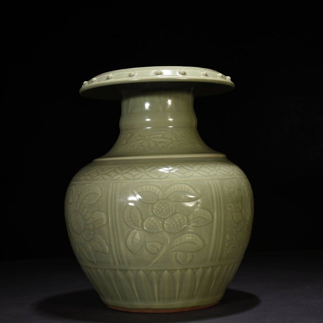 Yuan Longquan plum green glaze carved broken branches, flowers and fruits pattern flip-mouth bottle: Yuan Longquan plum green glaze carved broken branches, flowers and fruits pattern flip-mouth bottle 35*23 cm