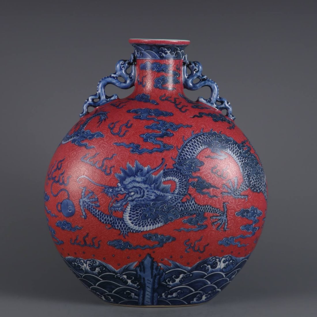 Qing Dynasty Qianlong period blue and white with rouge red ground carved cloud dragon pattern vase (1 of 9)